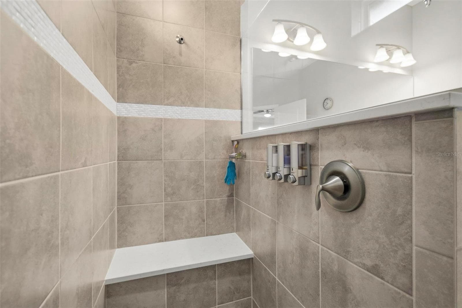 Primary shower built in seat - 7 TIDEWAY TRL, PALM COAST