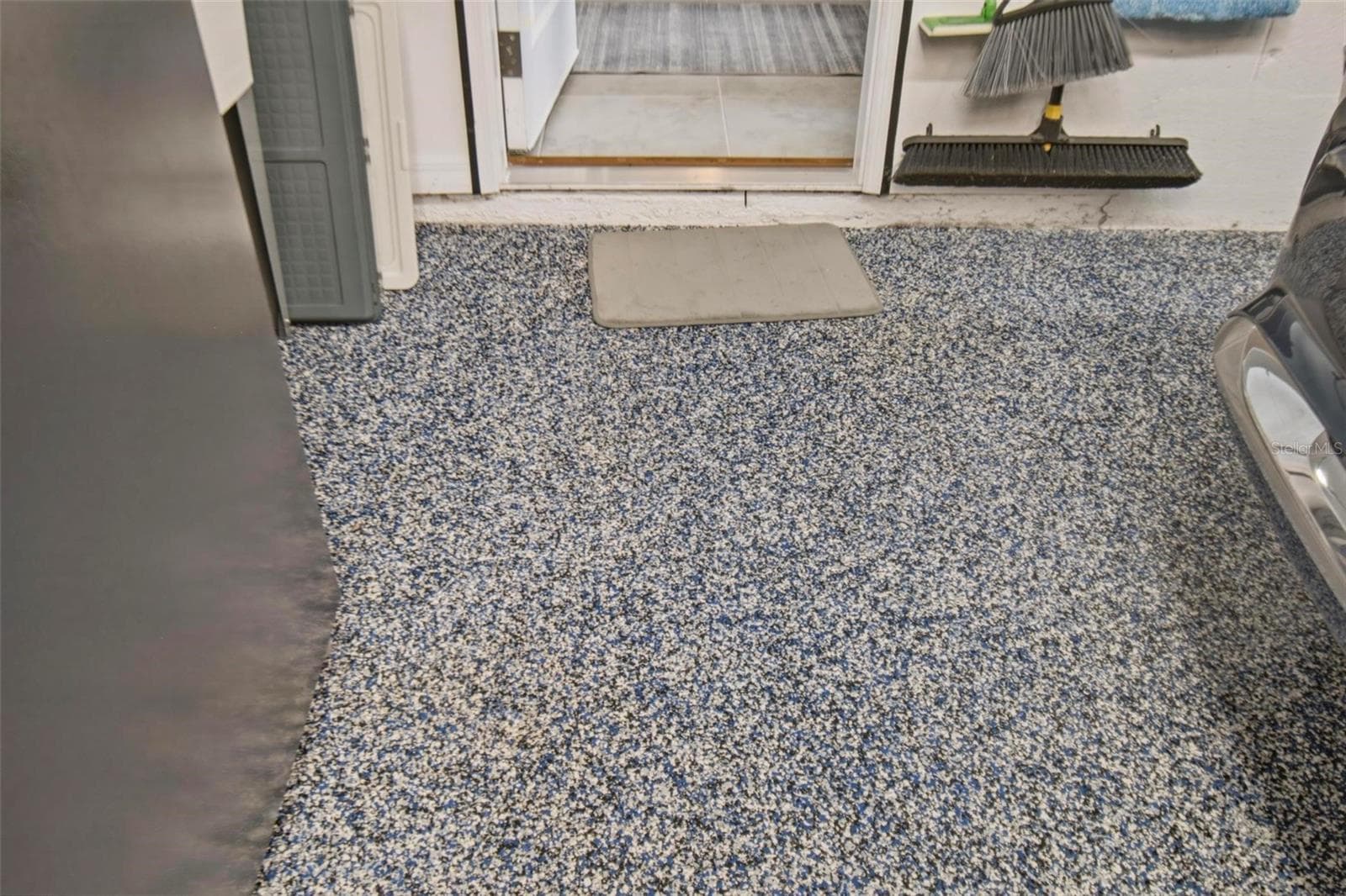 garage epoxied floor - 7 TIDEWAY TRL, PALM COAST