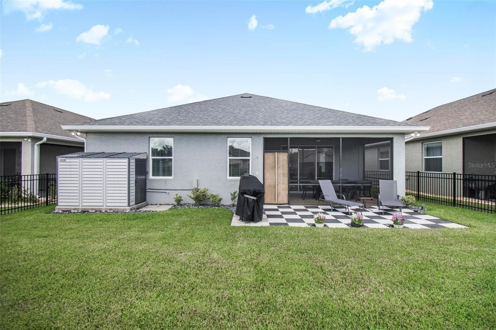backyard view of house and shed - 7 TIDEWAY TRL, PALM COAST