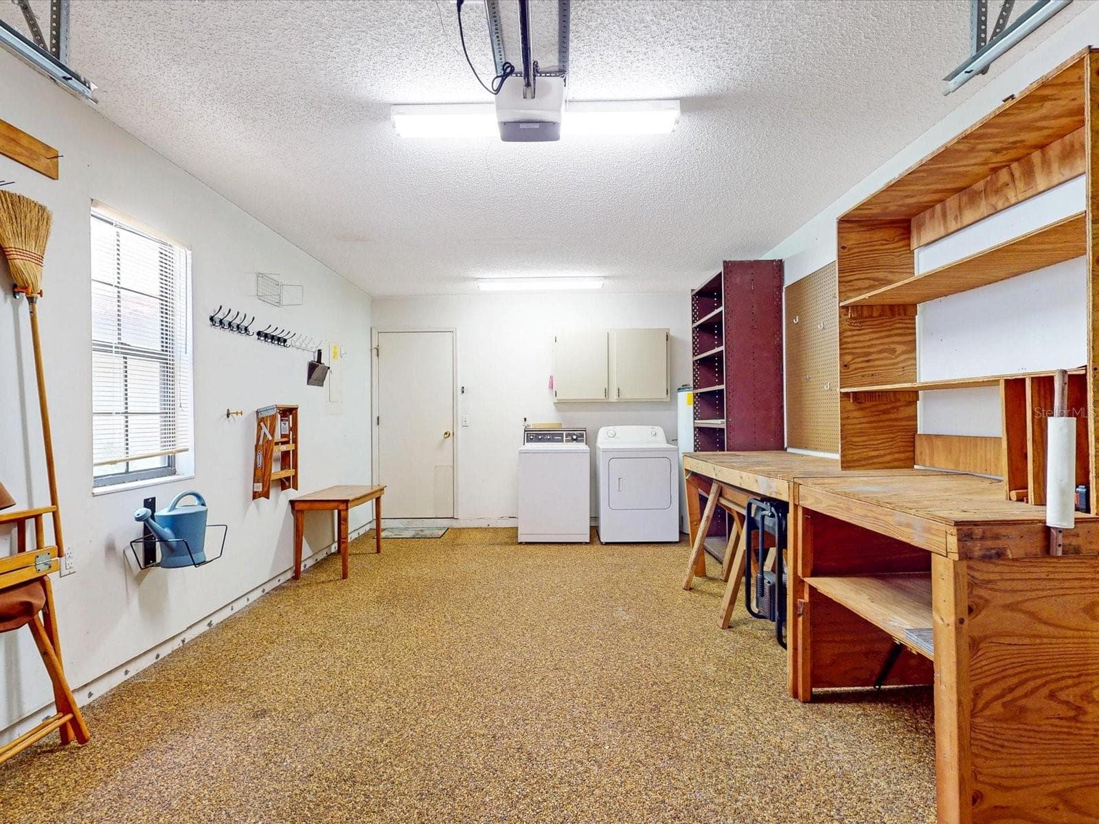 Laundry appliances and a work station all in one place - 105 COVENTRY LN, HAINES CITY