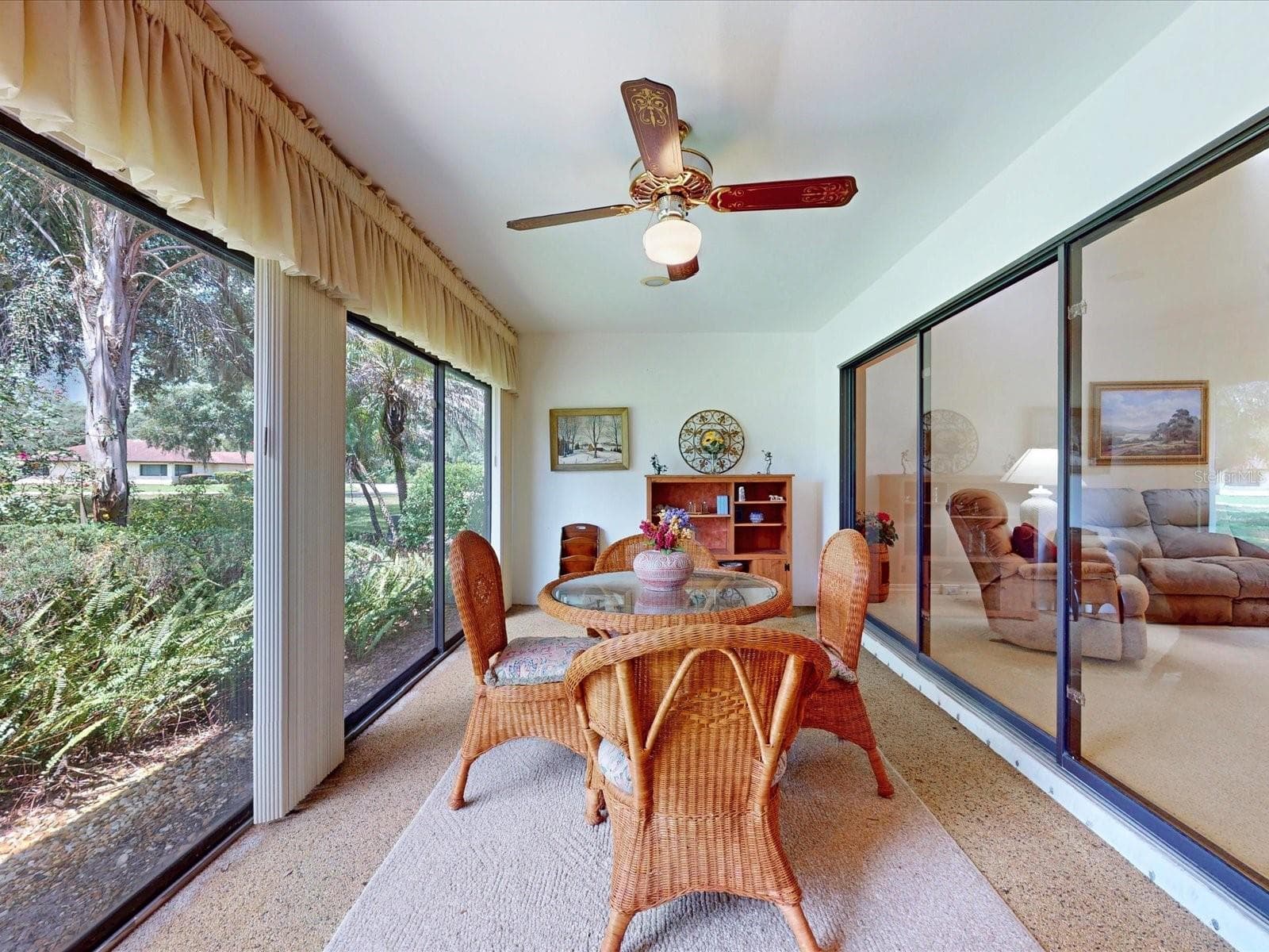 Quick step through the sliding glass door into the lanai - 105 COVENTRY LN, HAINES CITY