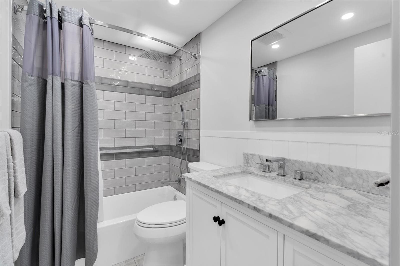 Remodeled Bath #2 - Quartz Counter tops - tub/shower combination - 1900 59TH AVE N #212, ST PETERSBURG
