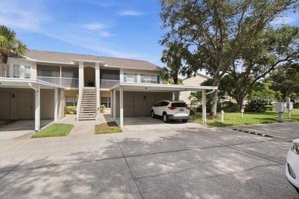 Exterior bldg with carport - 418 LAUREL LAKE DR #106, VENICE