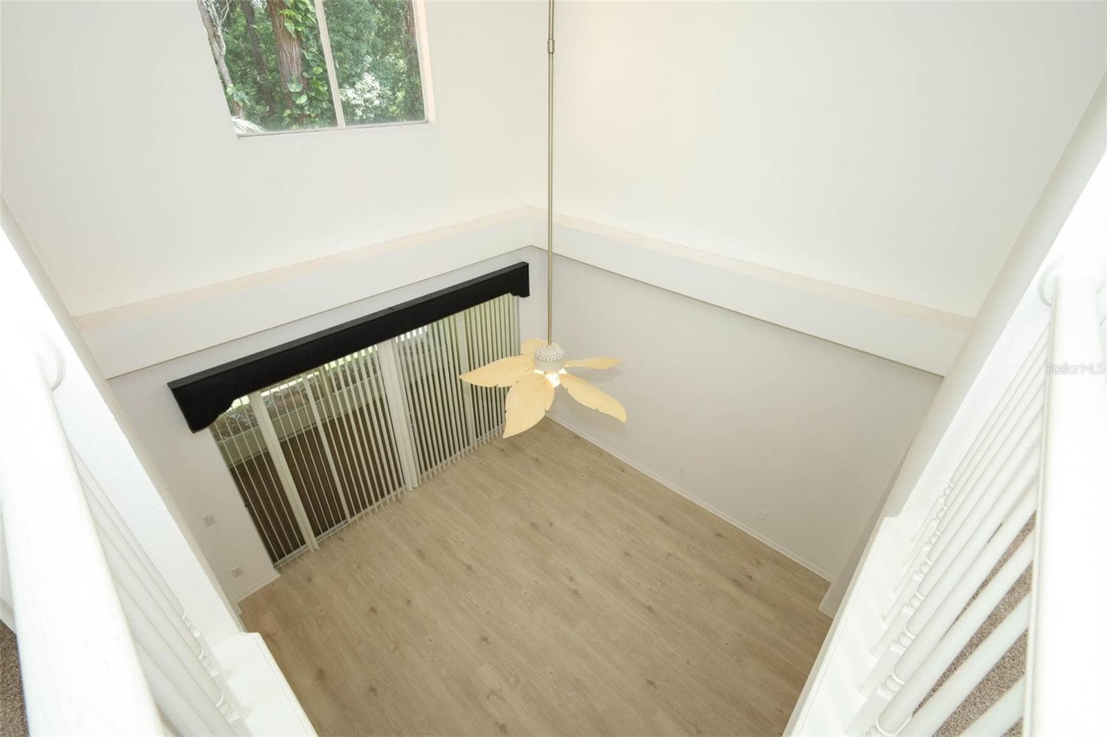 View of Family Room from Landing - 2247 WEKIVA VILLAGE LN, APOPKA