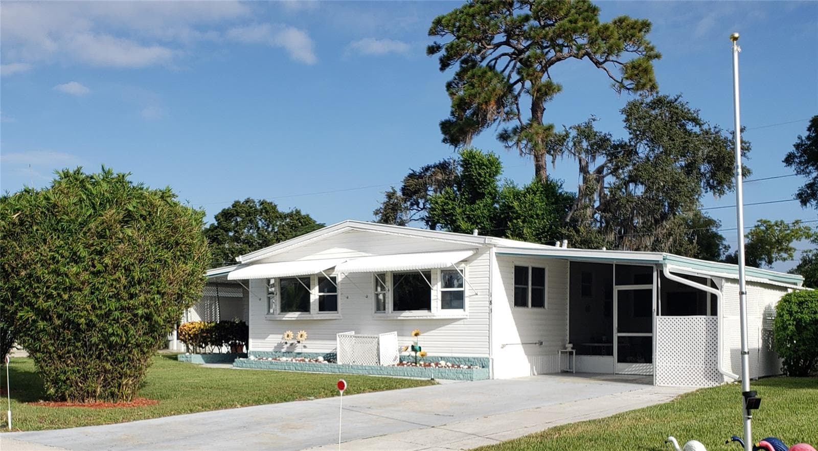 No Lot Rent—you own the land! New roof in Sept 2025 and a rare HOA-approved fenced yard for dogs. - 183 PHILADELPHIA BLVD #22, PALM HARBOR