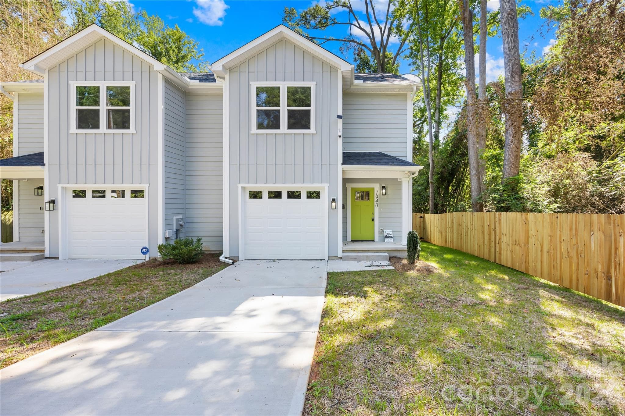 Front of the new construction duet on Purser Dr in Charlotte; each side is sold separately with its own entrance, driveway and garage - 1940 Purser Drive, Charlotte