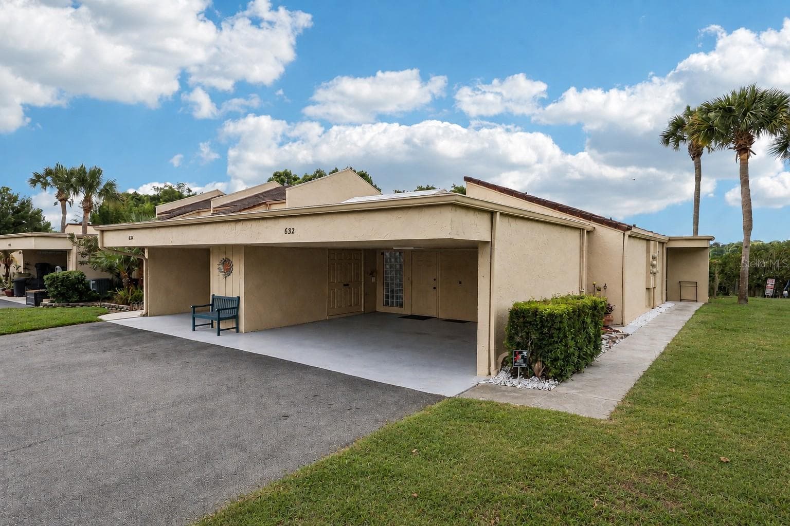 Enjoy the convenience of an ATTACHED 2-CAR COVERED CARPORT with storage, a feature seldom found in condominium living. - 632 DESOTO DR #632, CASSELBERRY