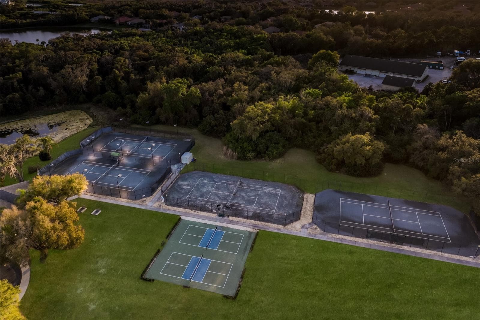 Aerial view of the tennis and pickle ball courts - 3649 WILDERNESS BLVD W, PARRISH