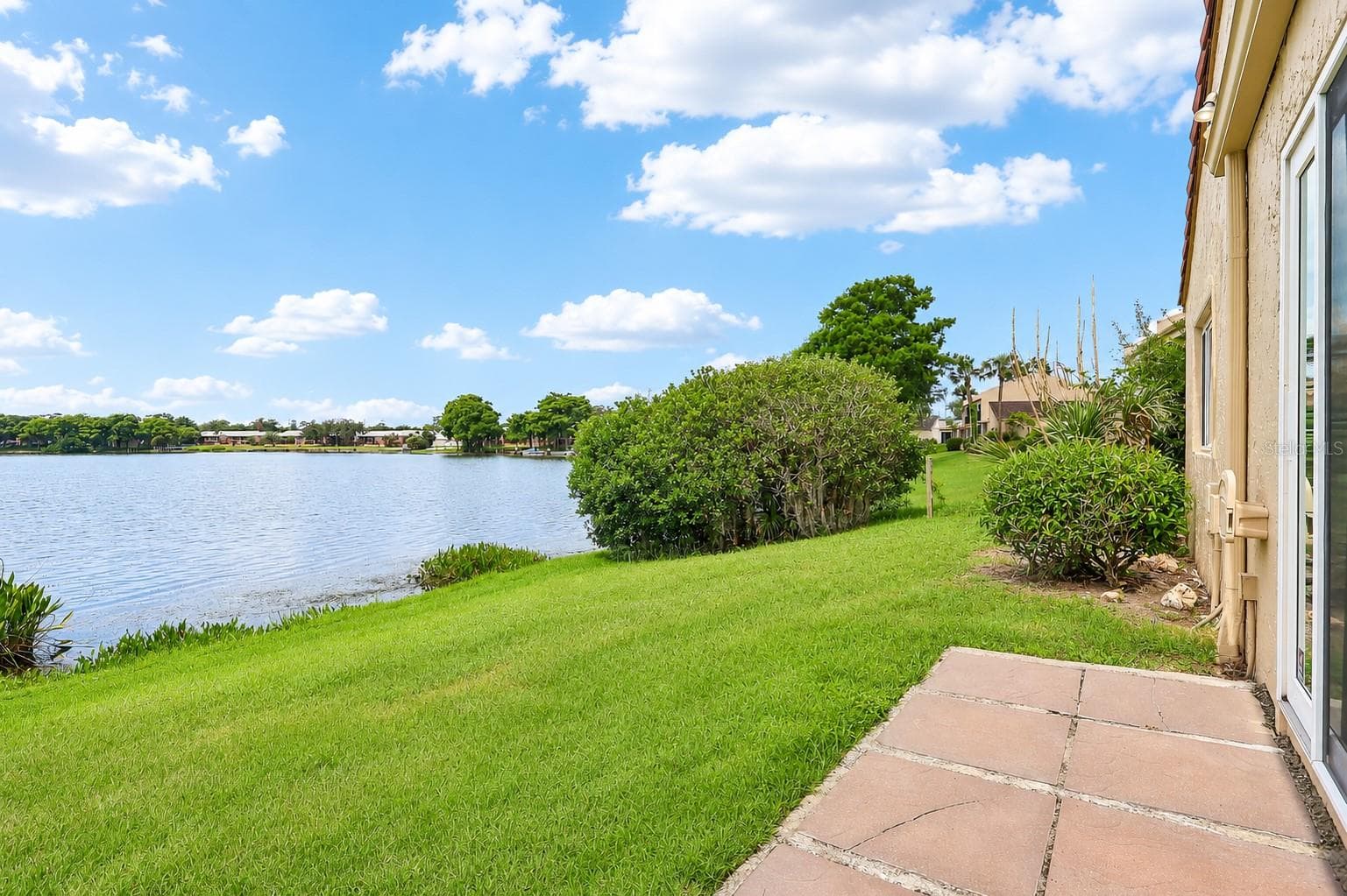 Step through the sliding glass doors and enjoy the beautiful view of Lake Howell. - 632 DESOTO DR #632, CASSELBERRY