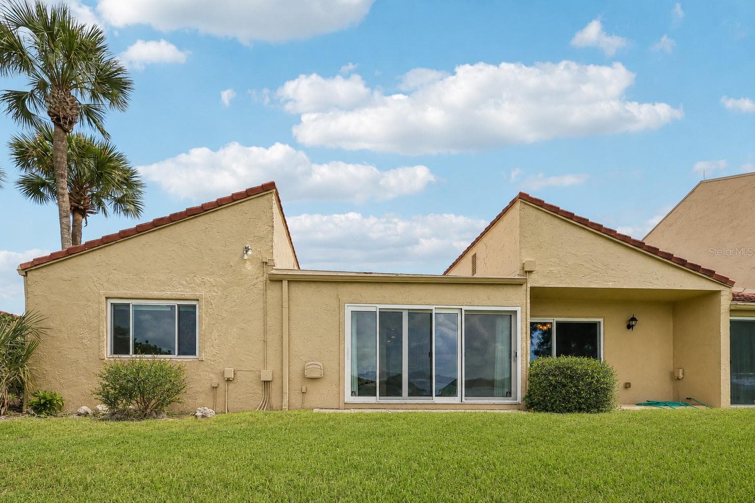 Step through the sliding glass doors and enjoy the beautiful view of Lake Howell. - 632 DESOTO DR #632, CASSELBERRY