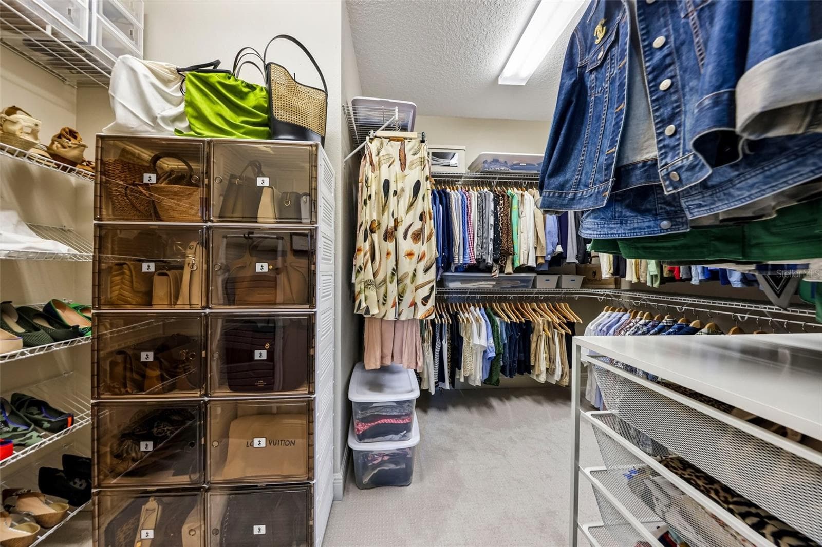 Walk-In Closet between Primary Bedroom and Primary Bathroom - 2088 NW 102ND BLVD, WILDWOOD