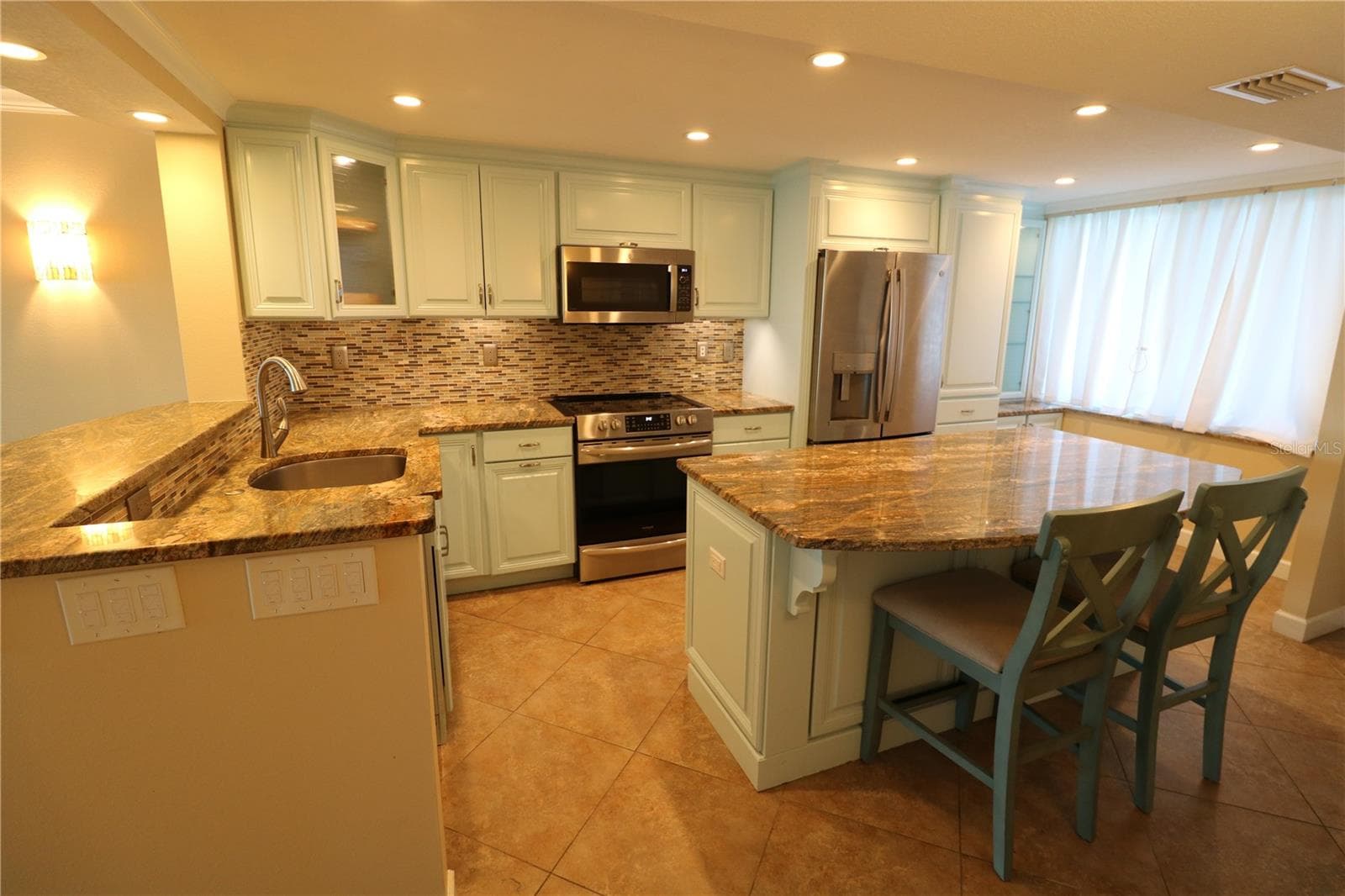 Large kitchen with quality cabinets and granite counters - 9495 BLIND PASS RD #504, ST PETE BEACH