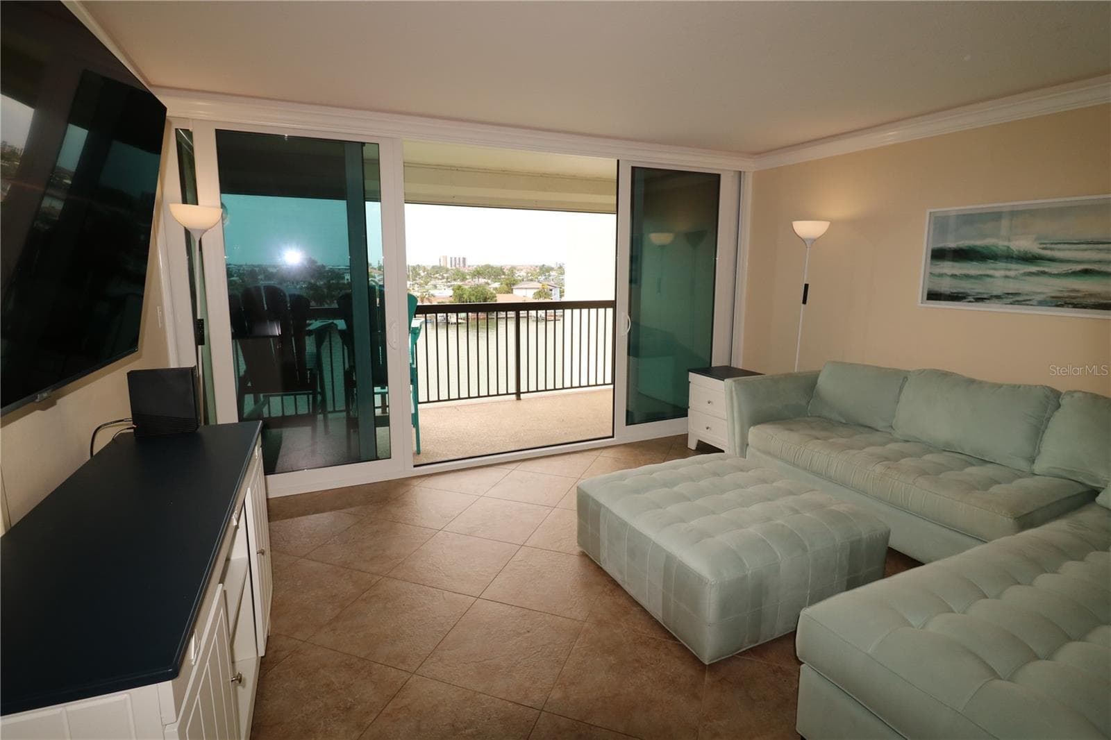 The sliders open for fresh air - 9495 BLIND PASS RD #504, ST PETE BEACH