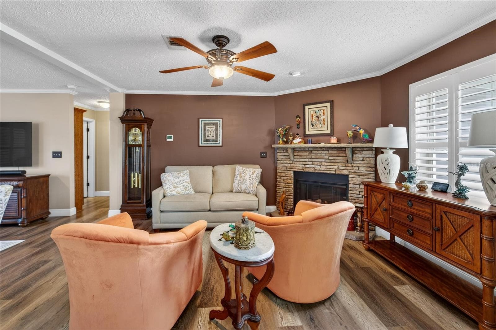 Living room room with fireplace - 10039 STERLING AVE, DADE CITY