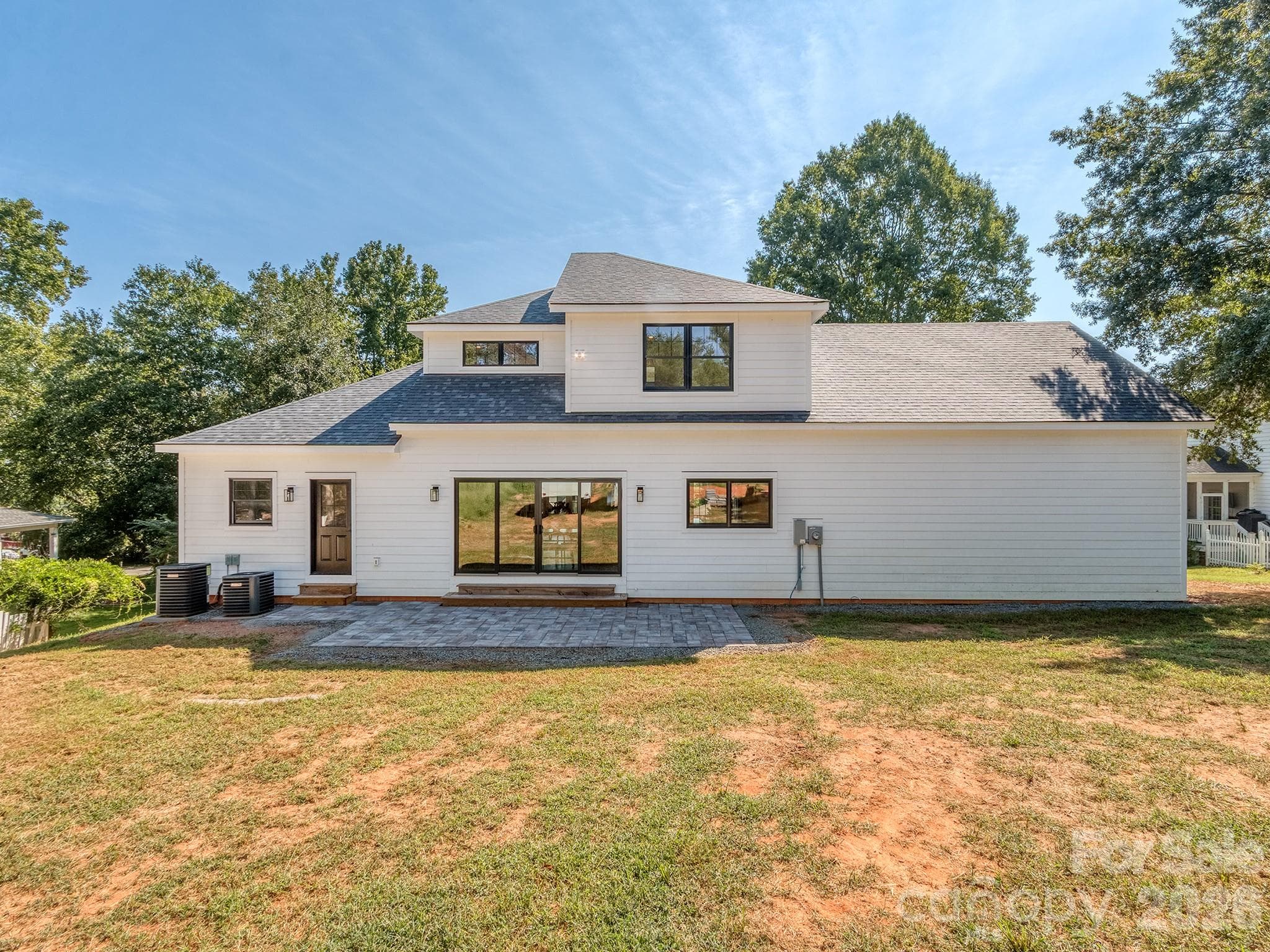Backyard with patio - 4899 Moonlite Bay Drive, Sherrills Ford