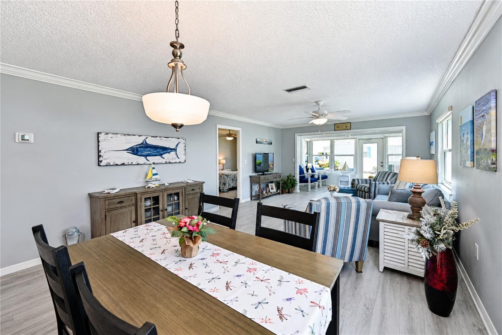 View of dining through to back - 9411 CONCORD CIR, BRADENTON