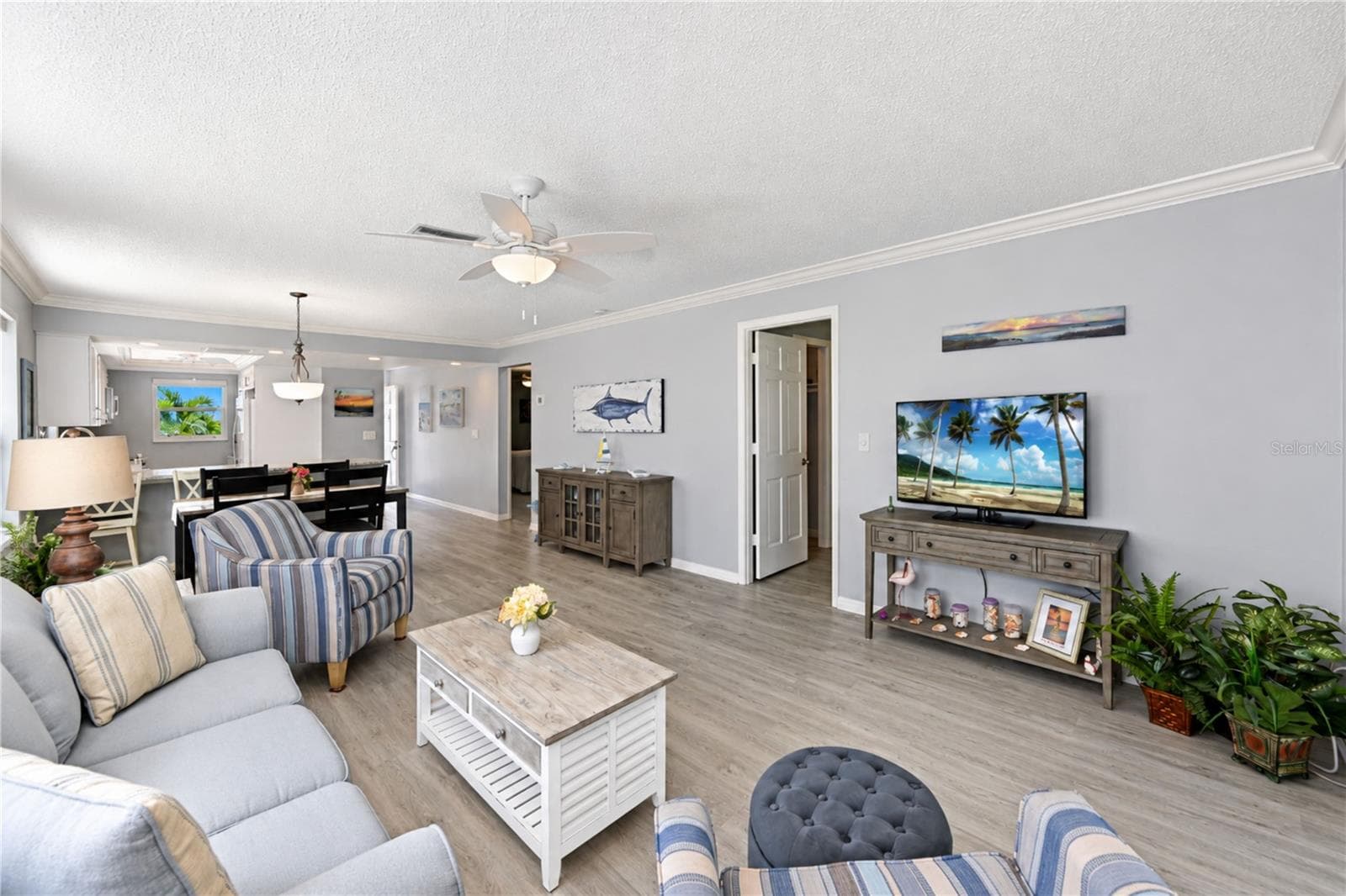 View through living room  to front - 9411 CONCORD CIR, BRADENTON