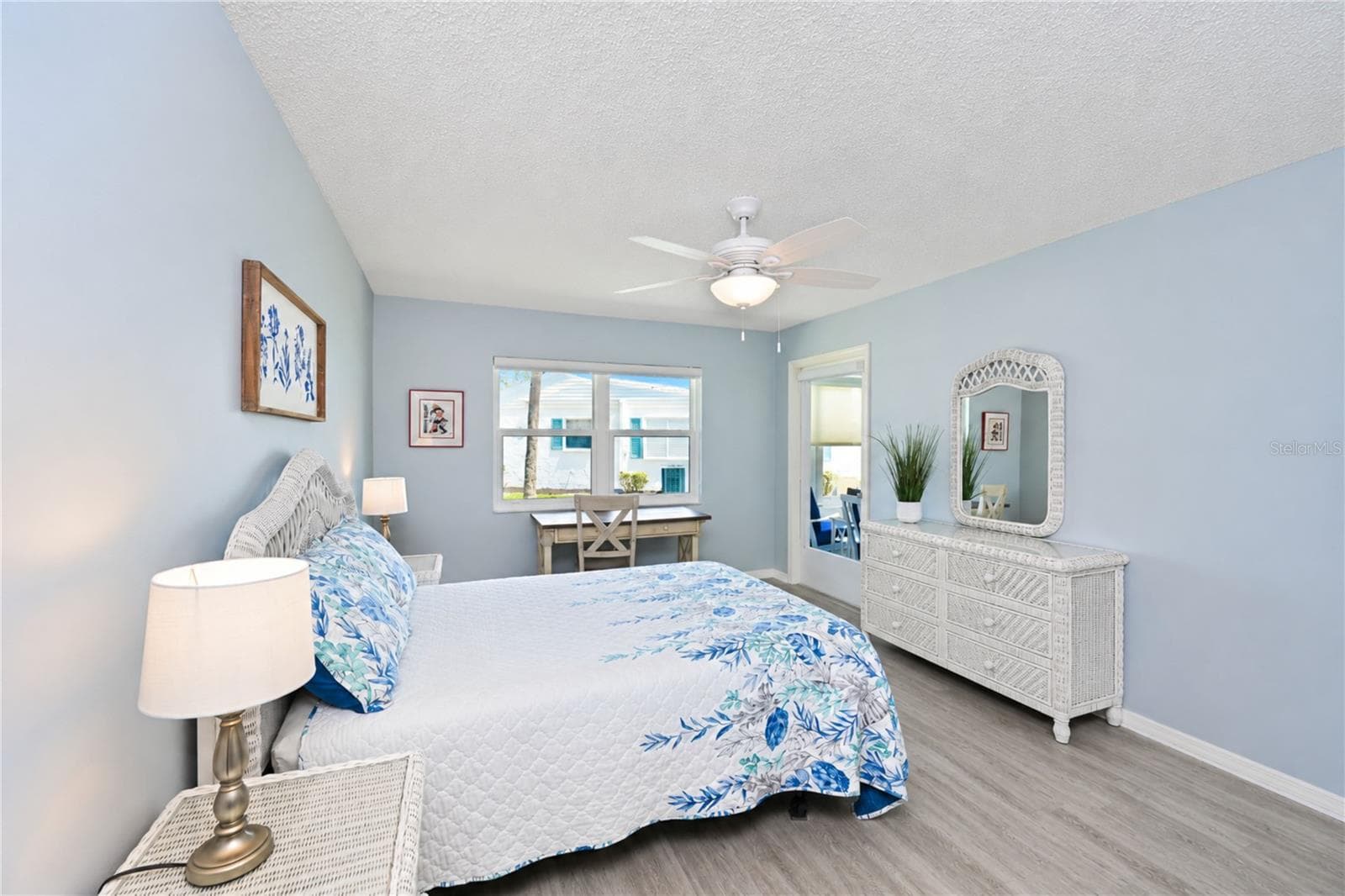 Primary bedroom from bathroom door - 9411 CONCORD CIR, BRADENTON