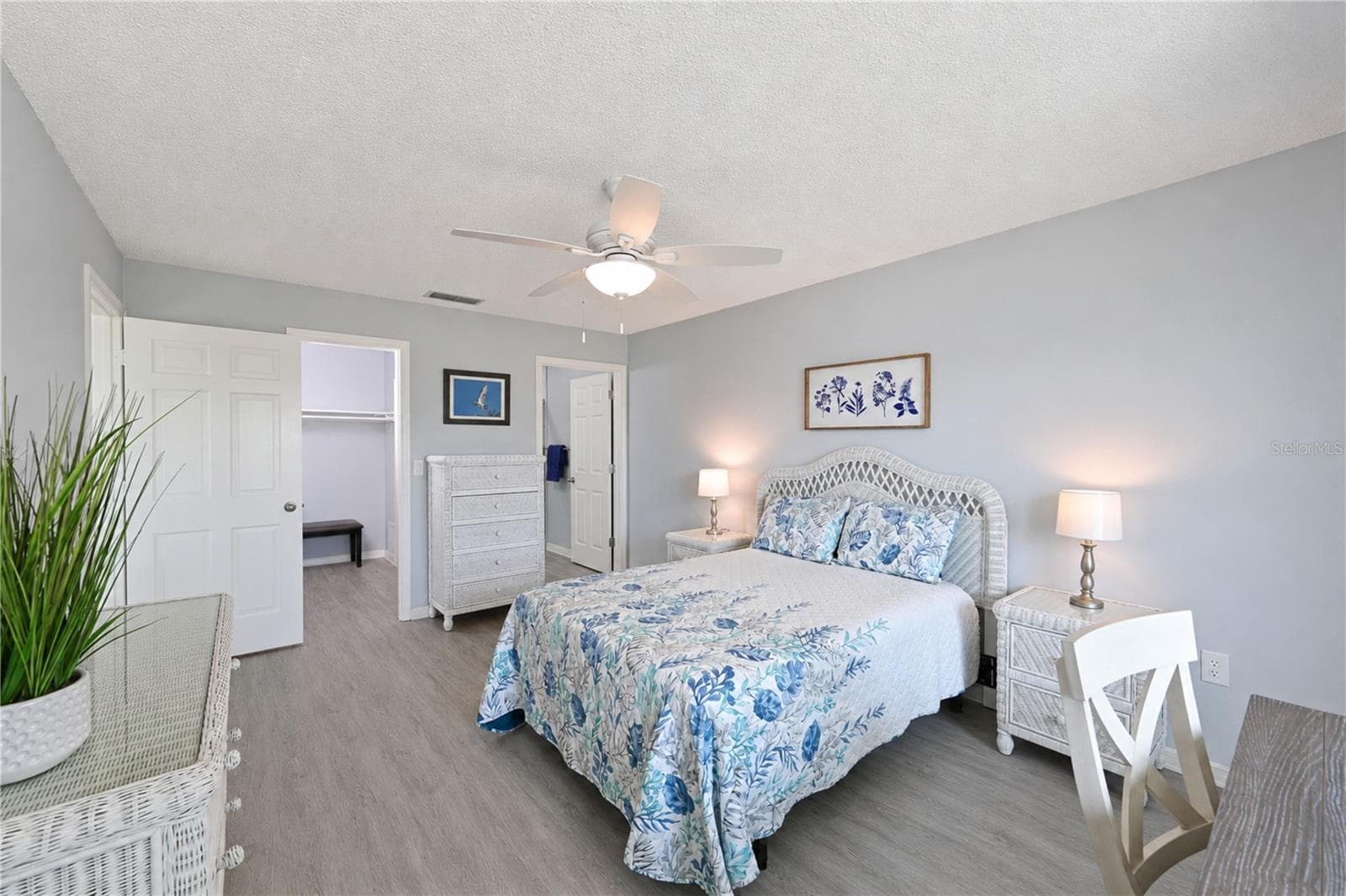 Primary ensuite bedroom from lanai door - 9411 CONCORD CIR, BRADENTON