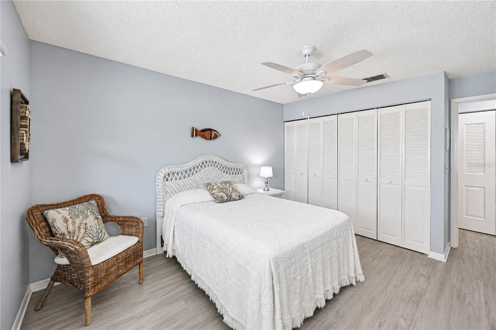 Secondary bedroom from corner - 9411 CONCORD CIR, BRADENTON