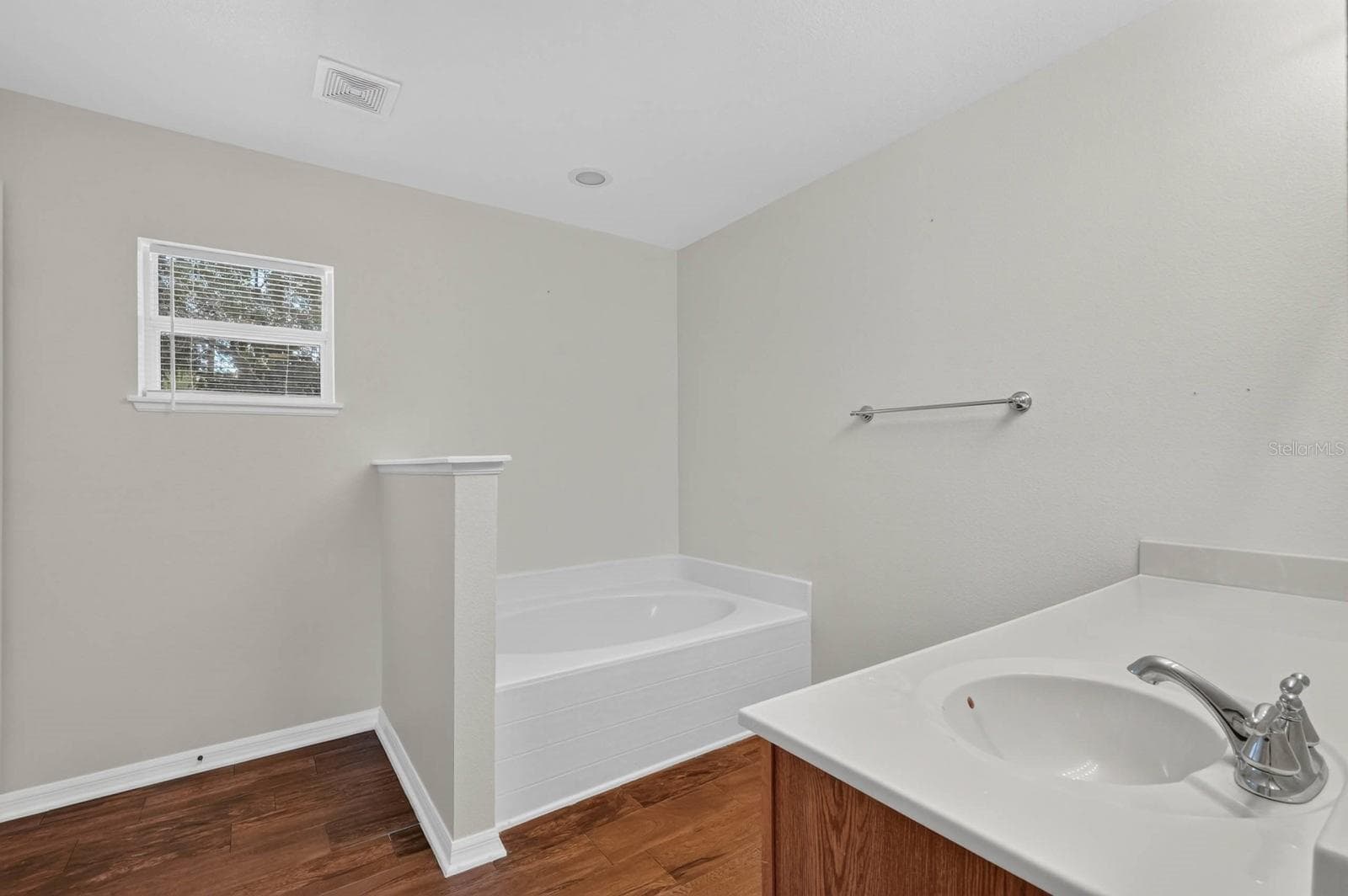 ensuite bathroom features soaking tub and separate shower - 99 PICKERING DR, PALM COAST