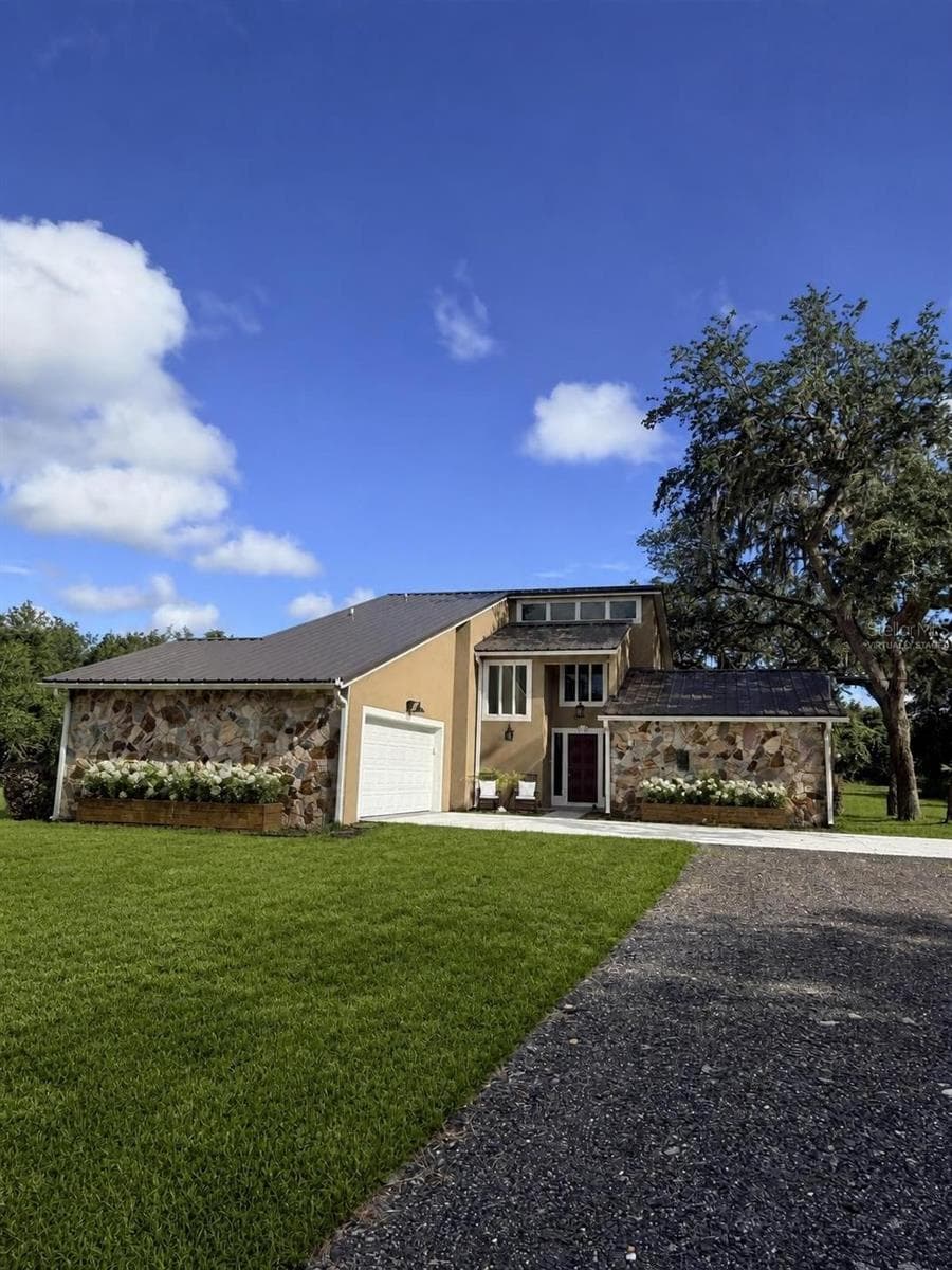 Virtually staged photo showcasing potential layout and design possibilities for the exterior . - 2598 ENTERPRISE OSTEEN RD, OSTEEN