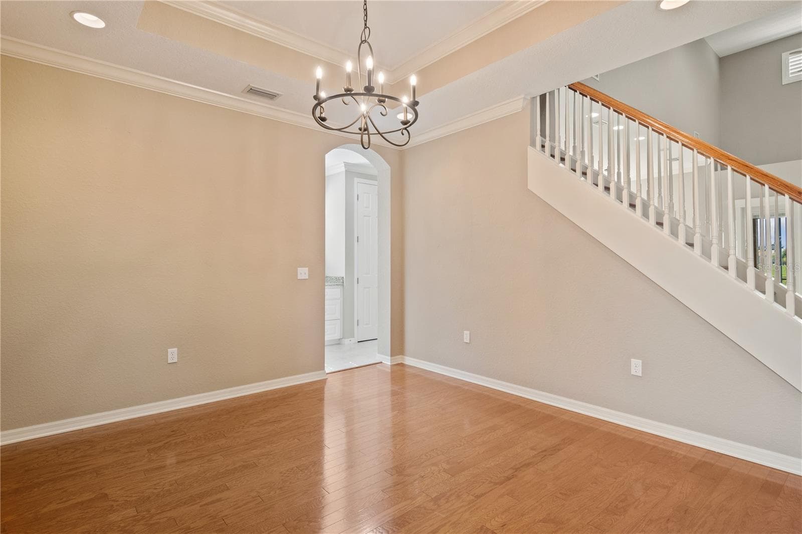 We should point out that these photos are from prior listing in 2024 - the walls have now been painted a more modern gray tone throughout the entire home. - 2464 LAUREL GLEN DR, LAKELAND