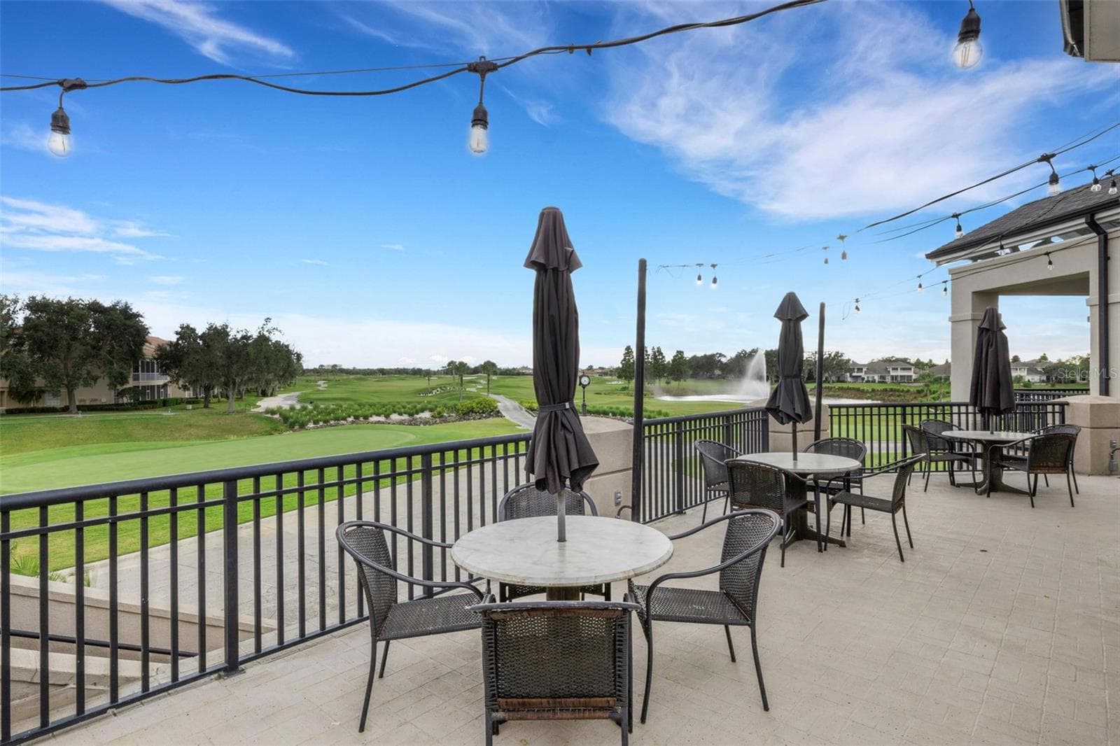 When the weather permits dining outside on the terrace is a wonderful option. - 2464 LAUREL GLEN DR, LAKELAND