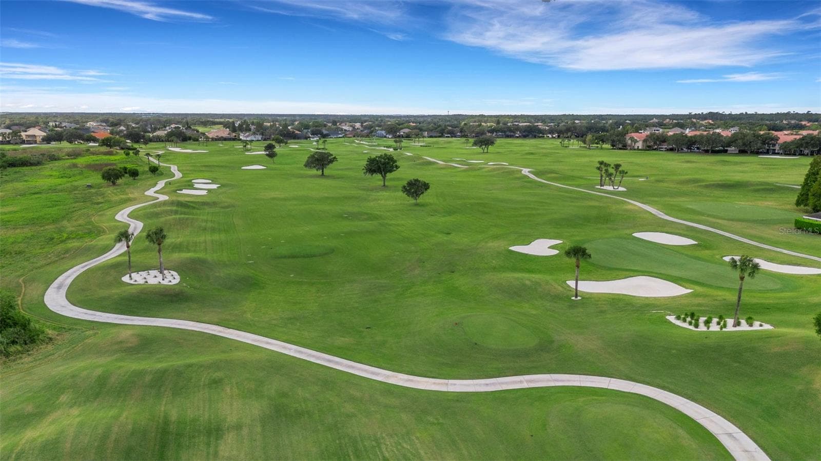and the bunkers layered with fresh clean sand . . . - 2464 LAUREL GLEN DR, LAKELAND