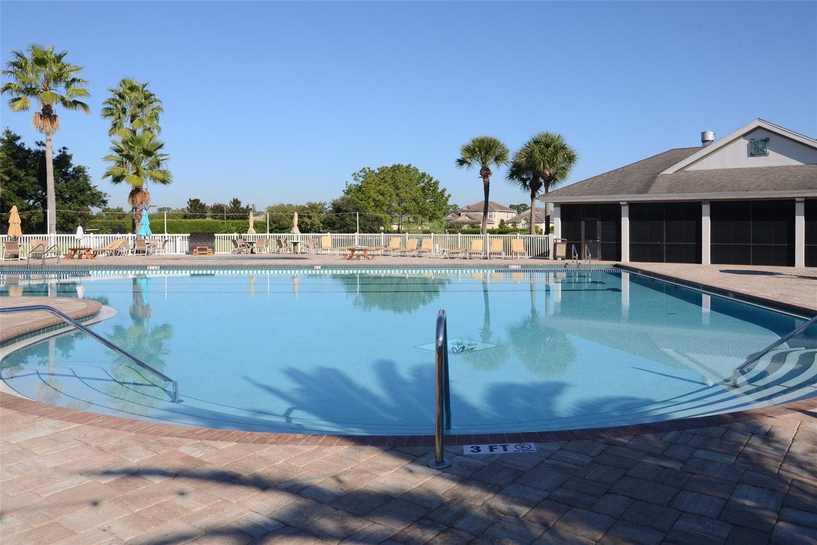 The large main pool is perfect to swim a few laps or cool off on a warm Florida day. - 2464 LAUREL GLEN DR, LAKELAND