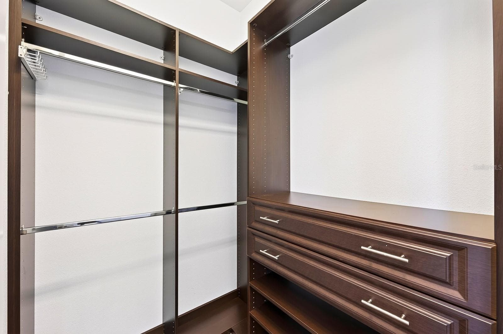 Custom storage in the dual walk-in closets. - 8130 LAUREATE BLVD, ORLANDO