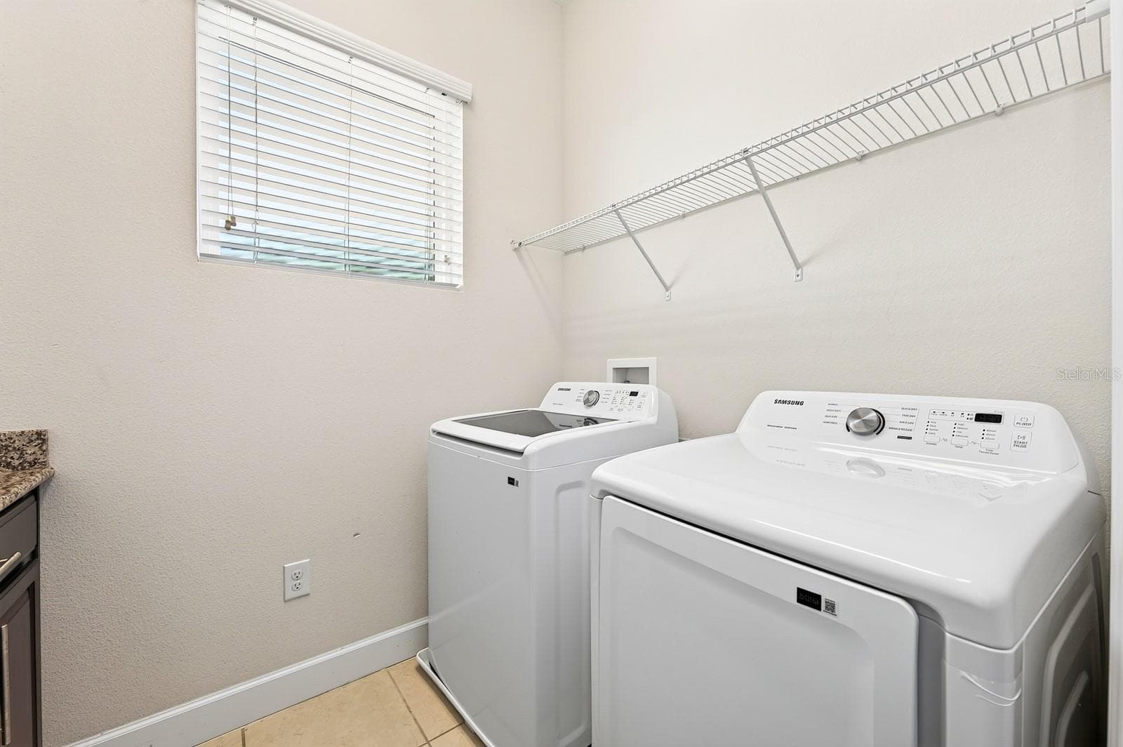 Convenient second floor laundry. - 8130 LAUREATE BLVD, ORLANDO