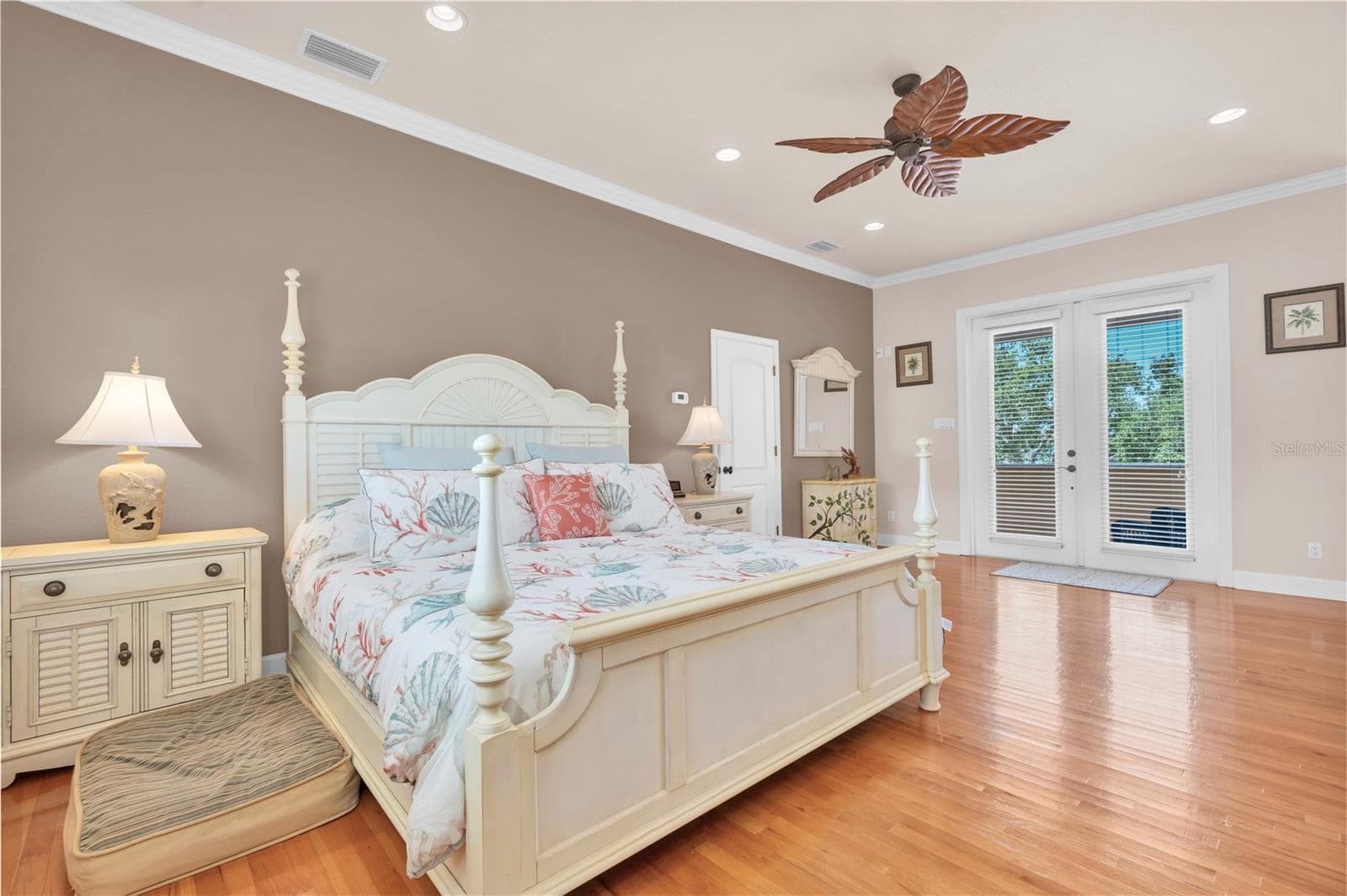 Primary suite and door to balcony - 16102 4TH ST E, REDINGTON BEACH