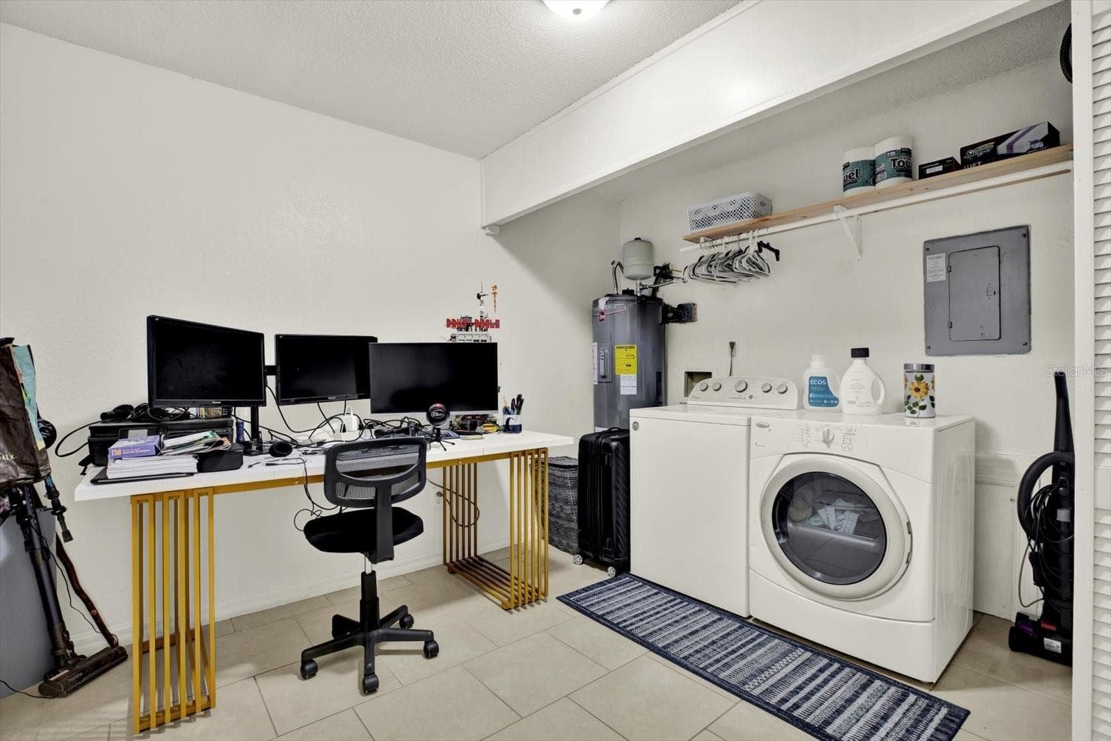 Over-sized Laundry/ Flex Space room one 1st level from the garage and front entry - 6311 93RD TER N #4403, PINELLAS PARK