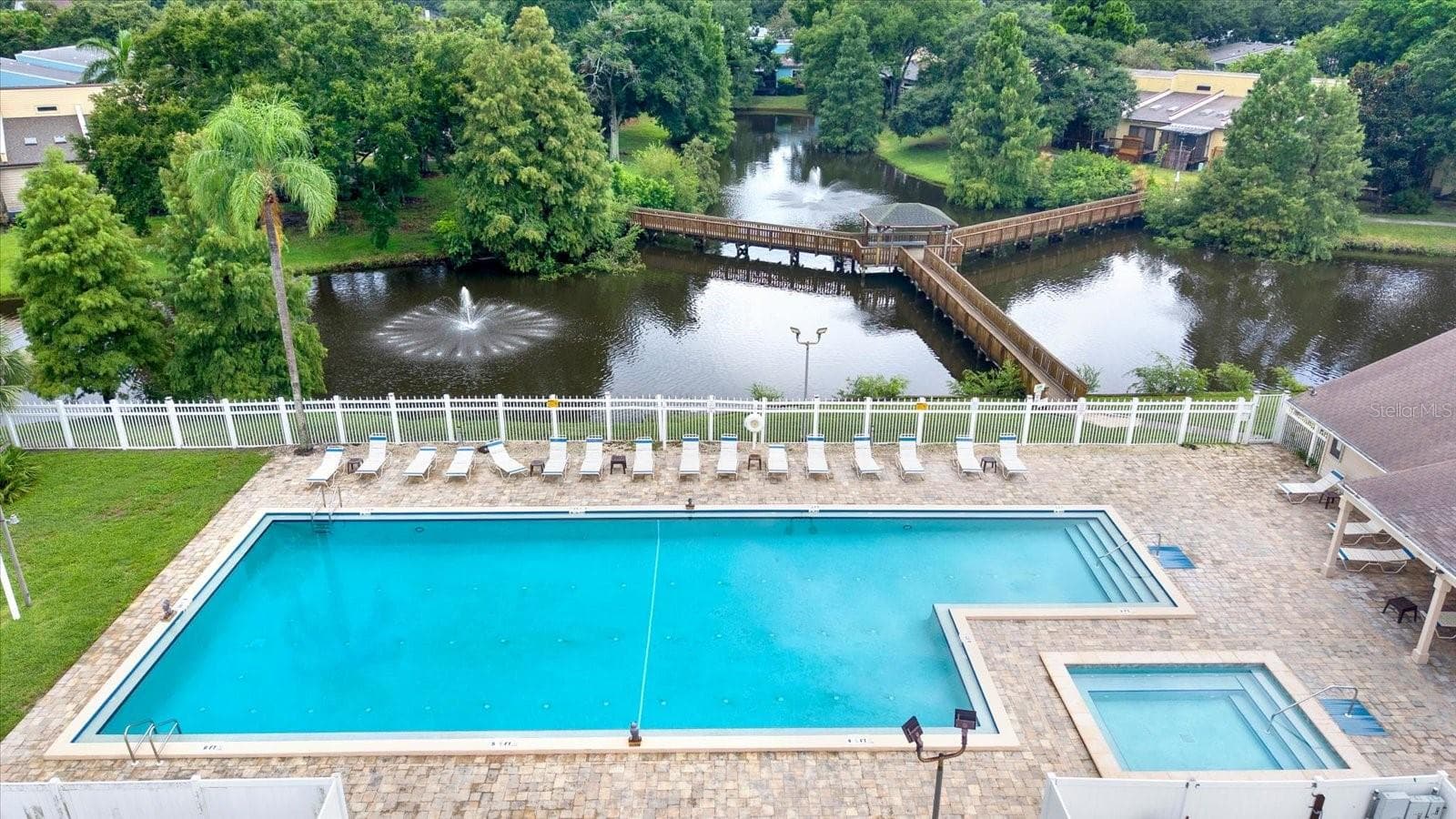 My Favorite part of the community. This HUGE SPARKLING Pool is never too crowded - 6311 93RD TER N #4403, PINELLAS PARK