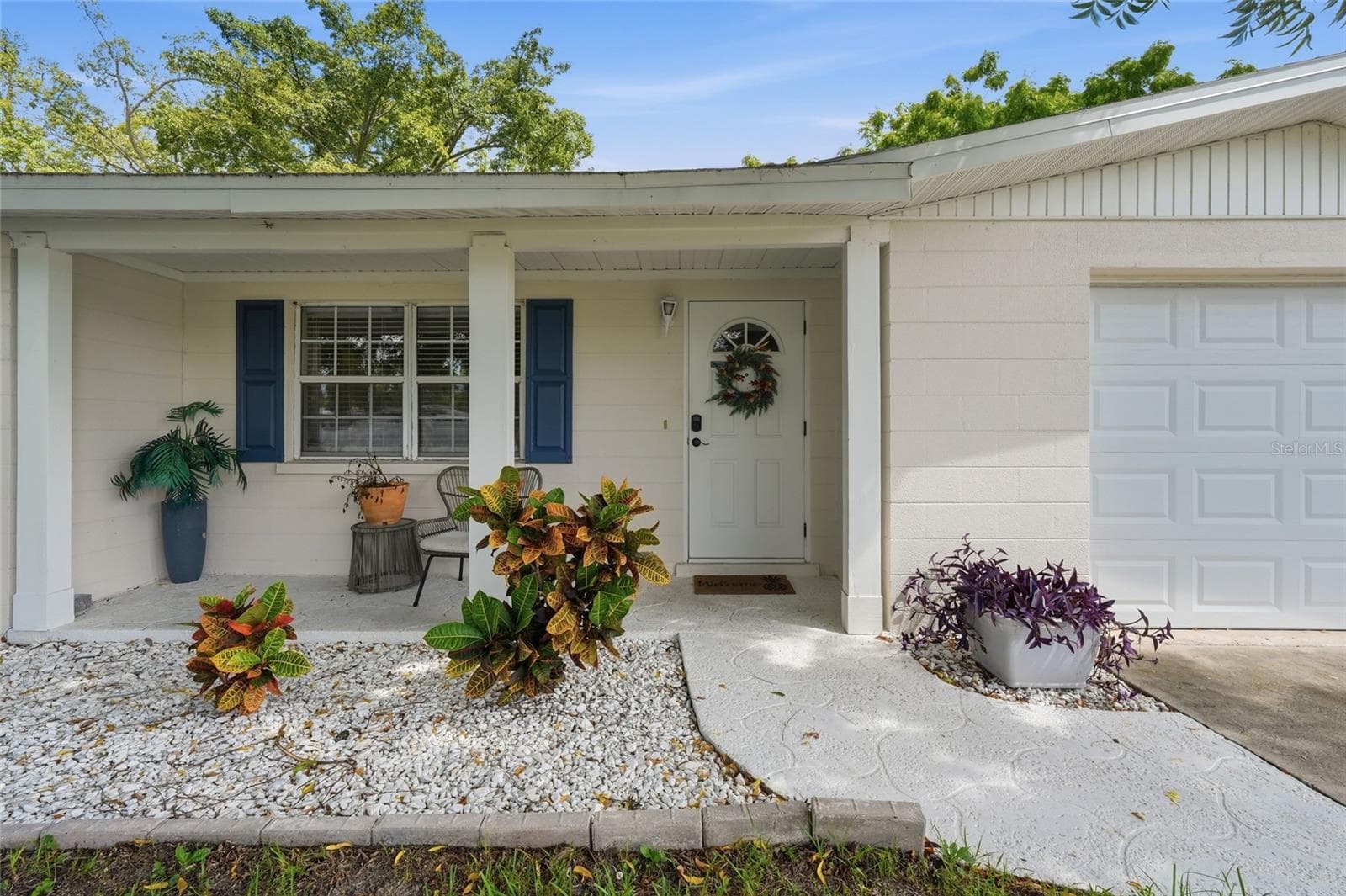 freshly painted exterior with covered patio - 5008 27TH AVE W, BRADENTON