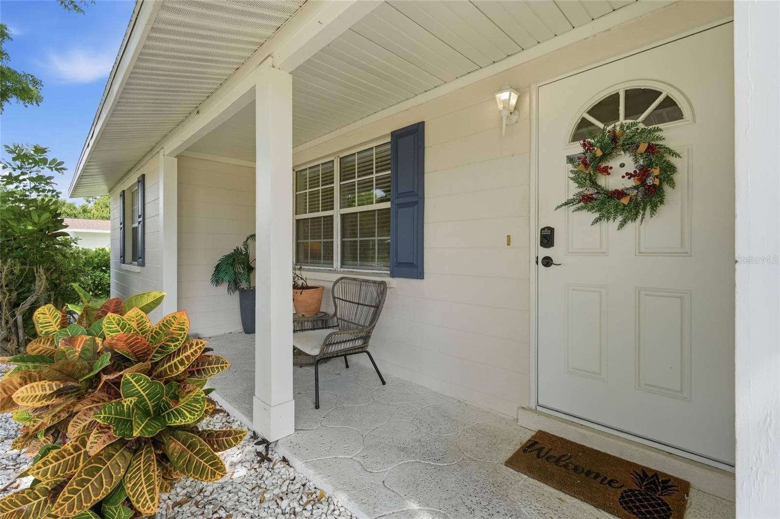 covered porch leading into the property - 5008 27TH AVE W, BRADENTON