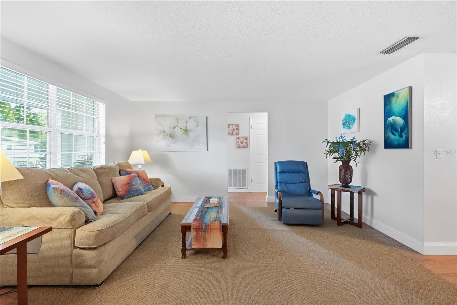 spacious living room big enough for a pullout couch and entertainment - 5008 27TH AVE W, BRADENTON