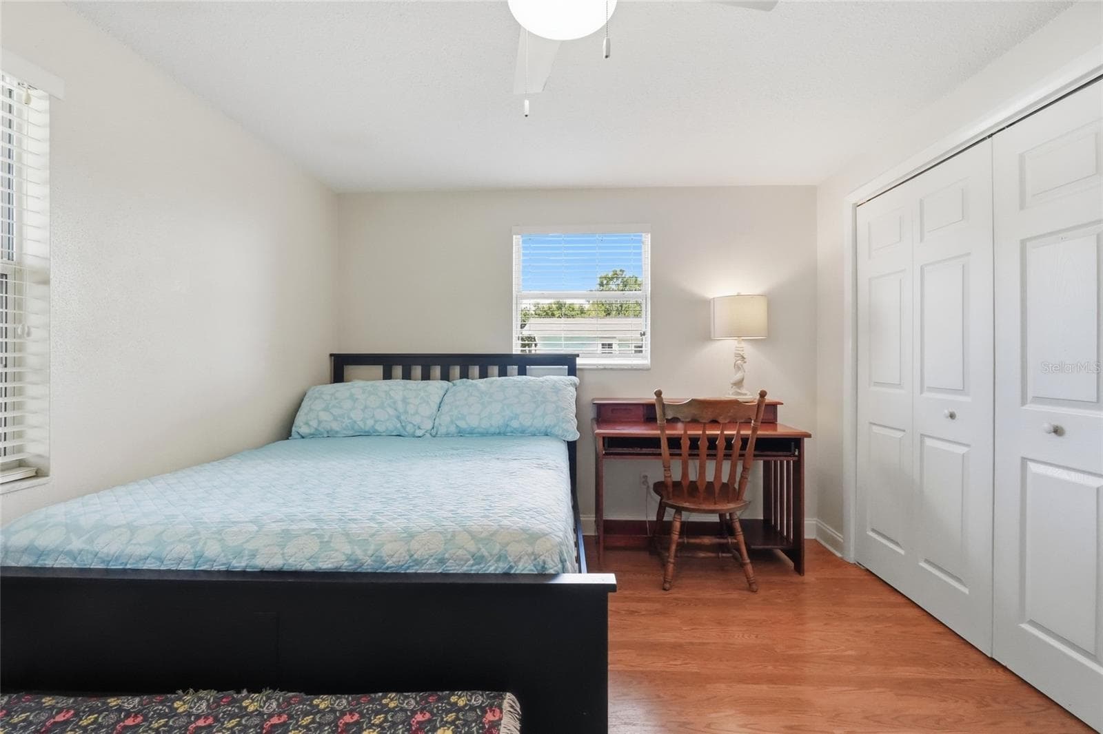 Guest bedroom with spacious closet and natural light - 5008 27TH AVE W, BRADENTON