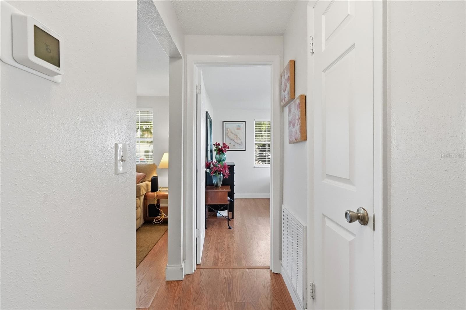 hallway that separates the two bedrooms - 5008 27TH AVE W, BRADENTON