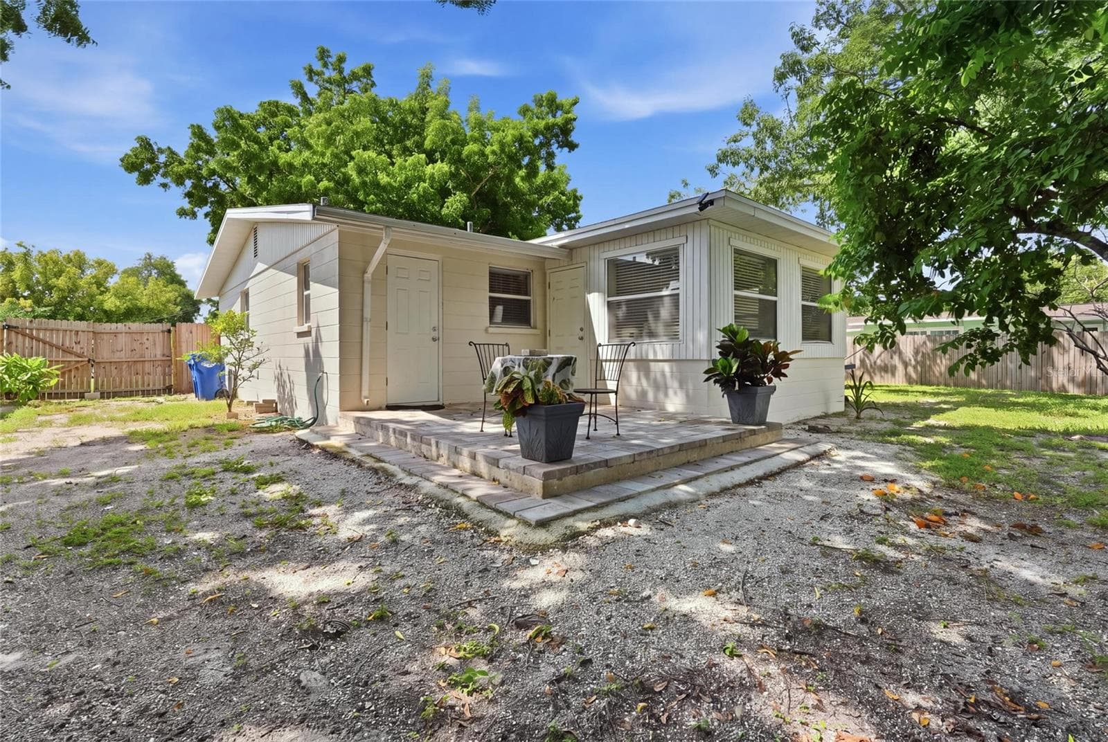 Fully fenced in yard with a double wide 5' gate big enough to fit your trailer, RV, boats and more - 5008 27TH AVE W, BRADENTON