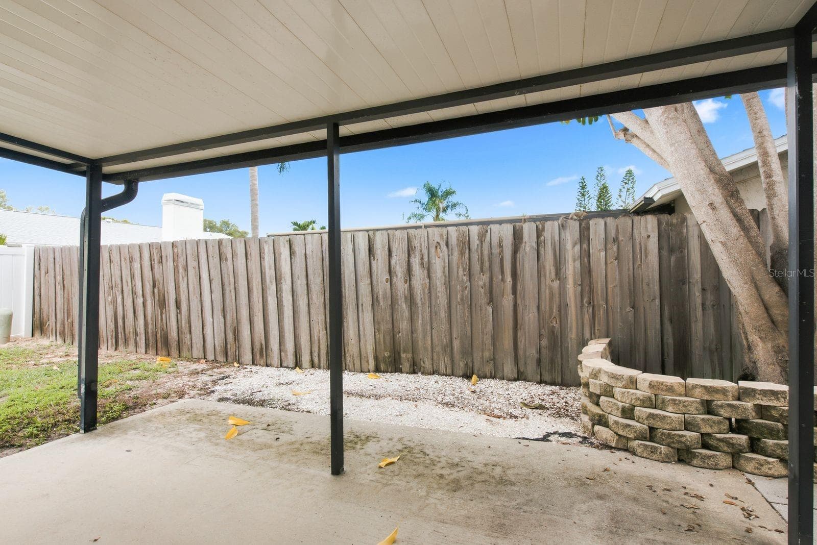 Covered porch made for relaxing Florida afternoons. - 12620 115TH ST, LARGO