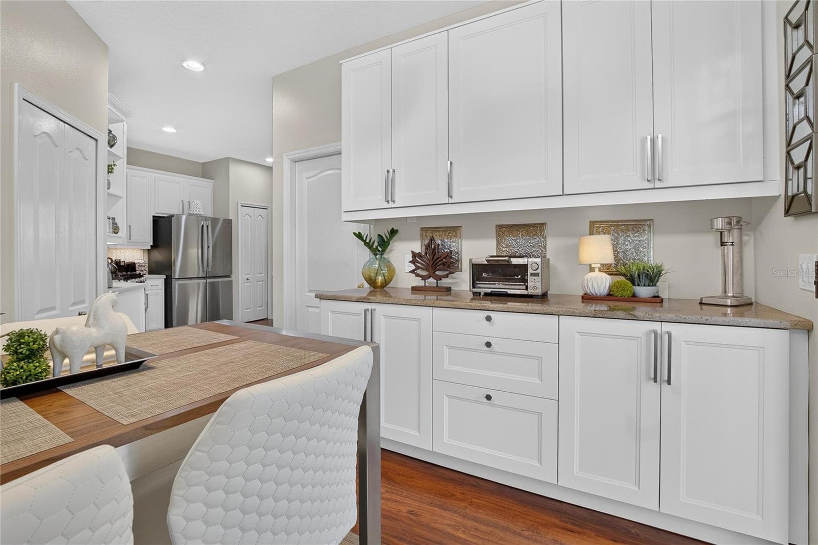 Built-in cabinetry provides exceptional additional storage and serving space. - 10807 SIERRA VISTA PL, TAMPA