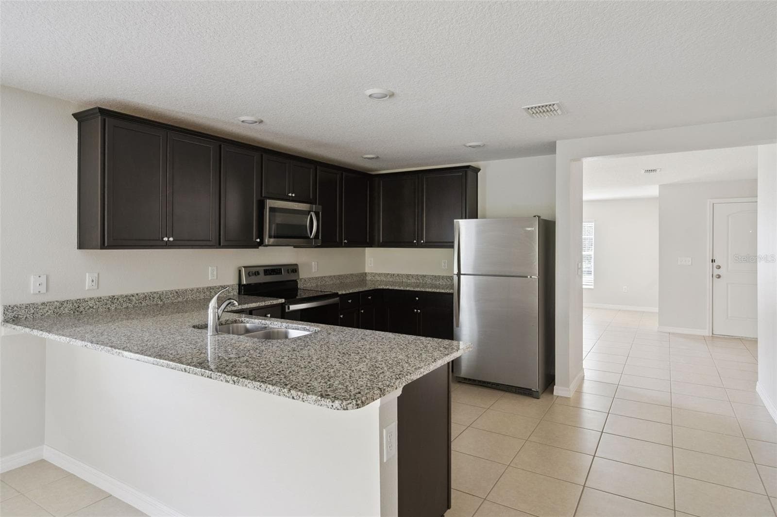 Single Family Residence at 1602 ORNE ST, MASCOTTE, photo 10 of 28