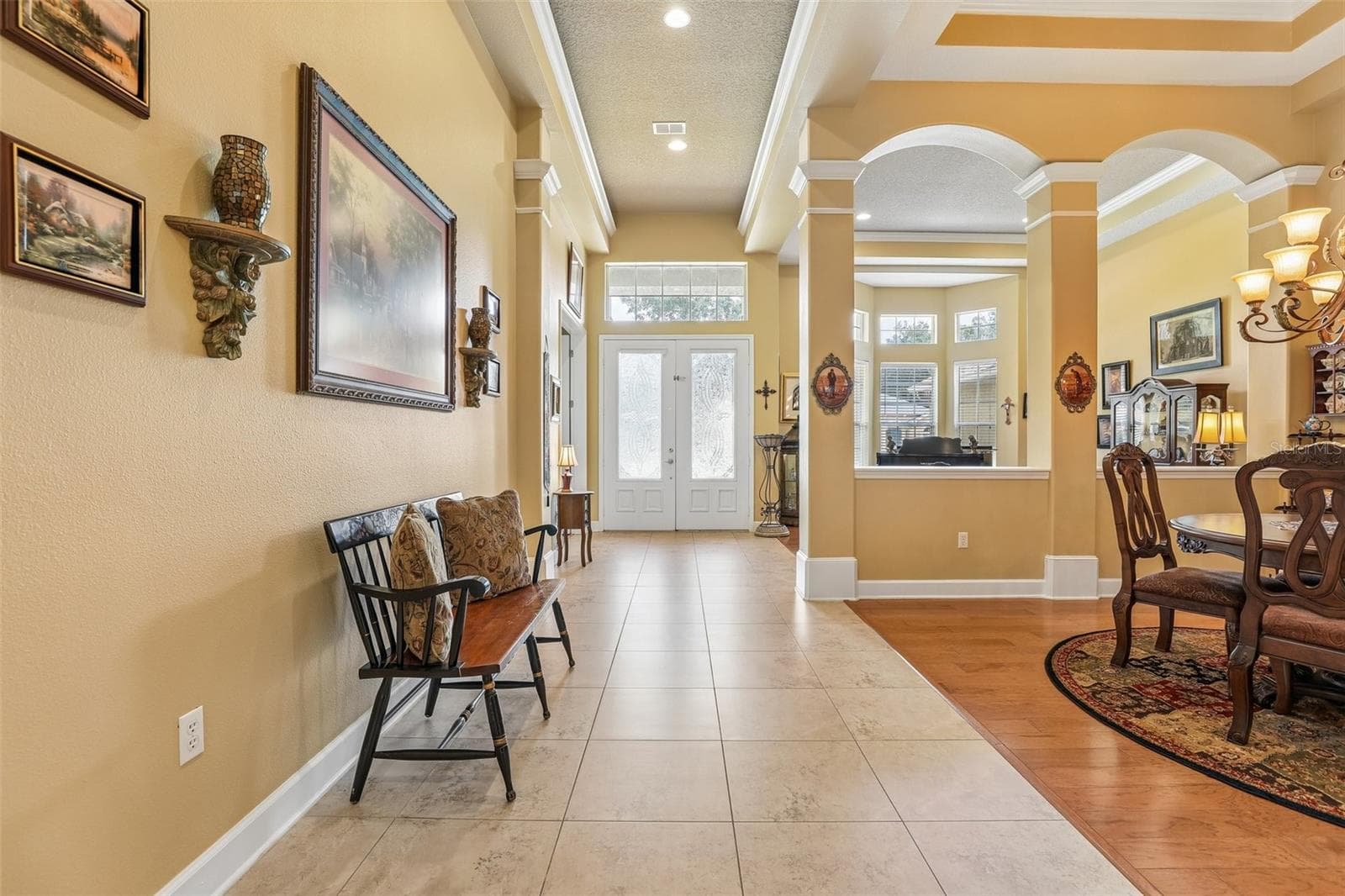 Inside, the expansive floor plan offers plenty of room to spread out without sacrificing connection. - 2431 PONKAN SUMMIT DR, APOPKA