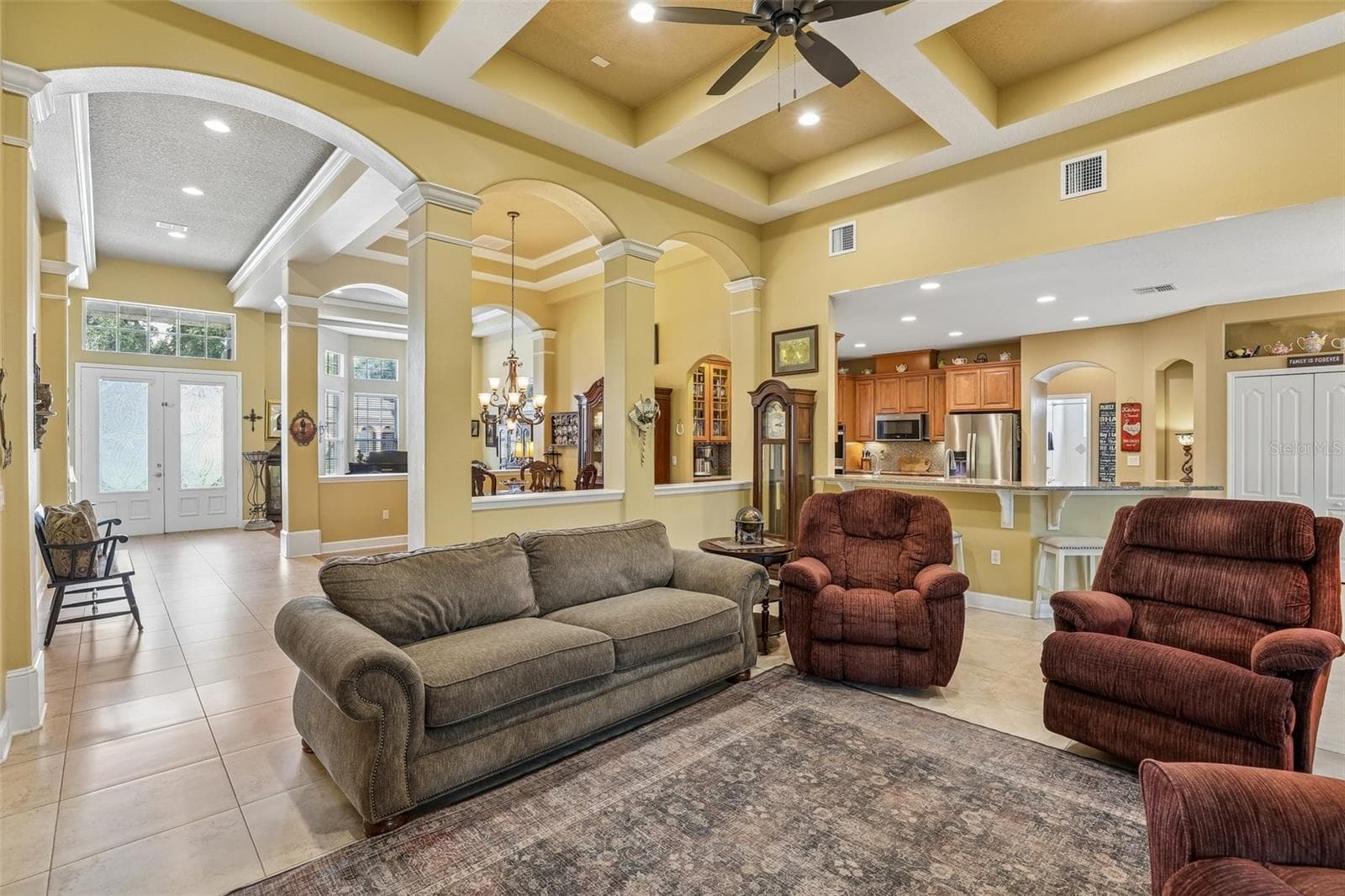 Elevated spaces all flow to the heart of the home. - 2431 PONKAN SUMMIT DR, APOPKA