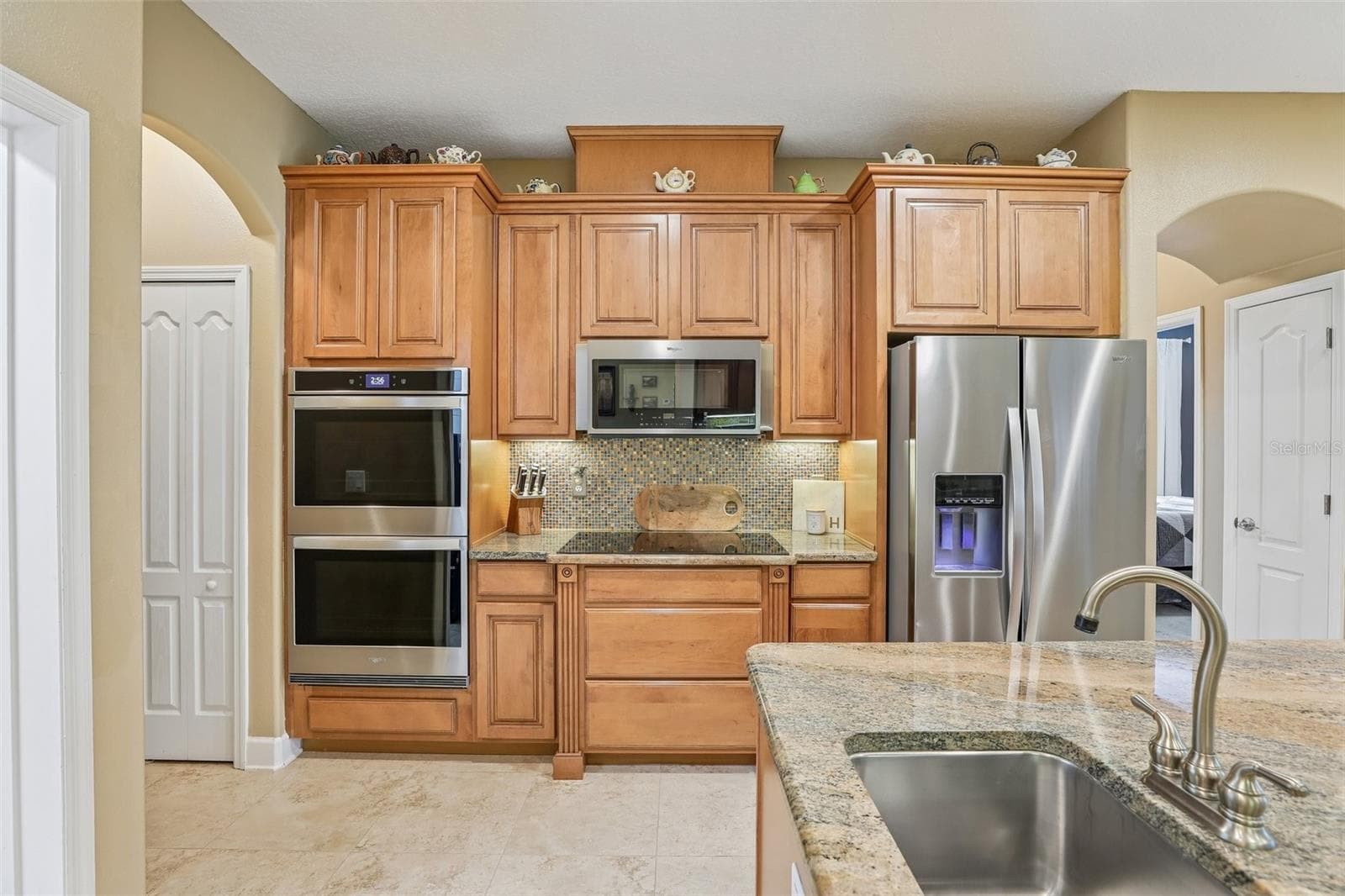 Built-in, upgraded stainless steel appliances. - 2431 PONKAN SUMMIT DR, APOPKA