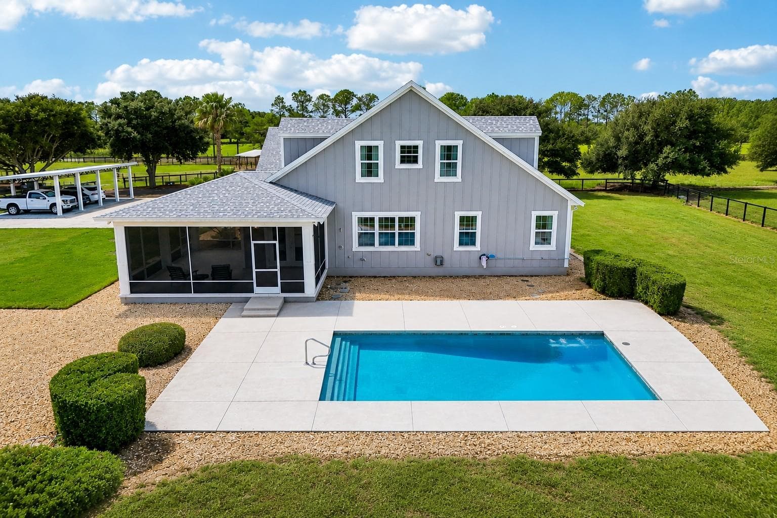 Rear of home and pool - 2088 NW 102ND BLVD, WILDWOOD