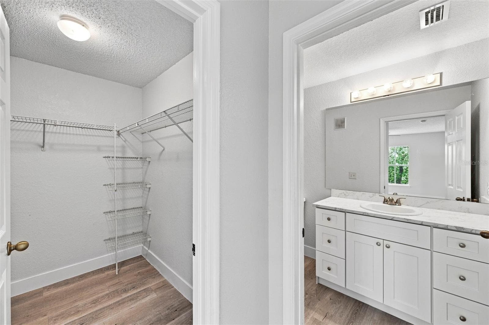 Bedroom 1 walk in closet - 18001 RICHMOND PLACE DR #136, TAMPA