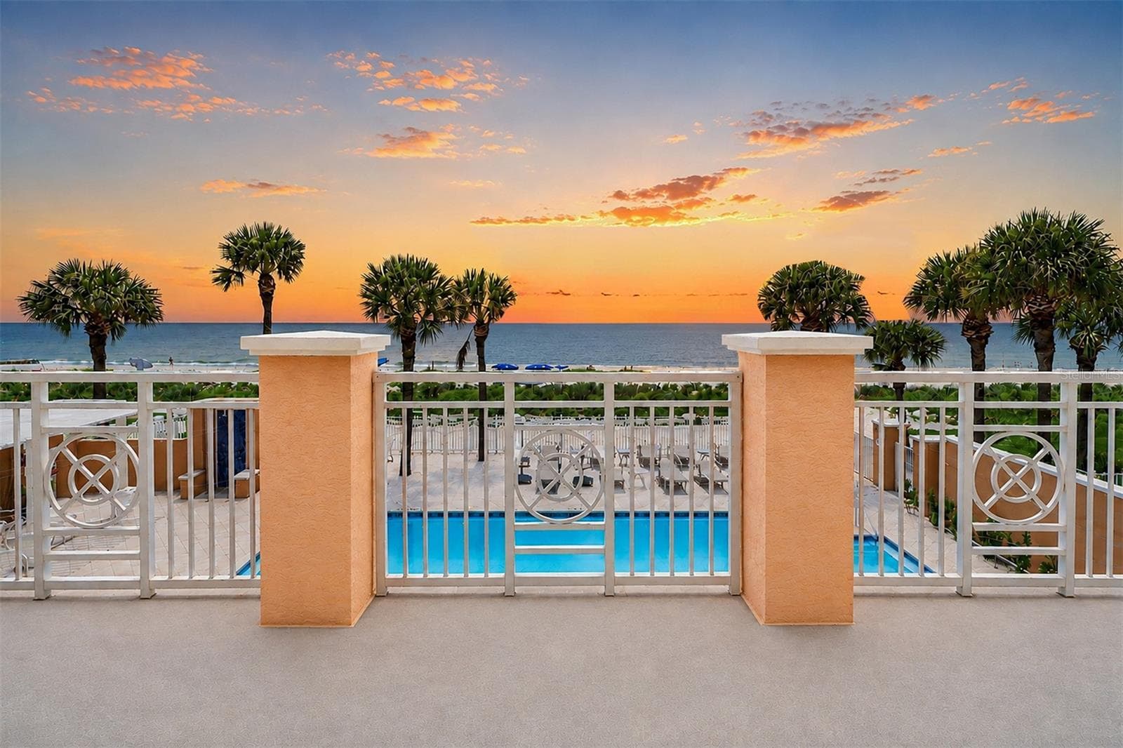 ... 2nd Floor Landing - Right Outside Clubhouse &  Workout Facility.. Lounging Area Looking Over Pool At the Gulf .. There are Stairs Down to Pool or Dedicated Elevator inside by Clubhouse Hallway. - 15208 GULF BLVD #404, MADEIRA BEACH